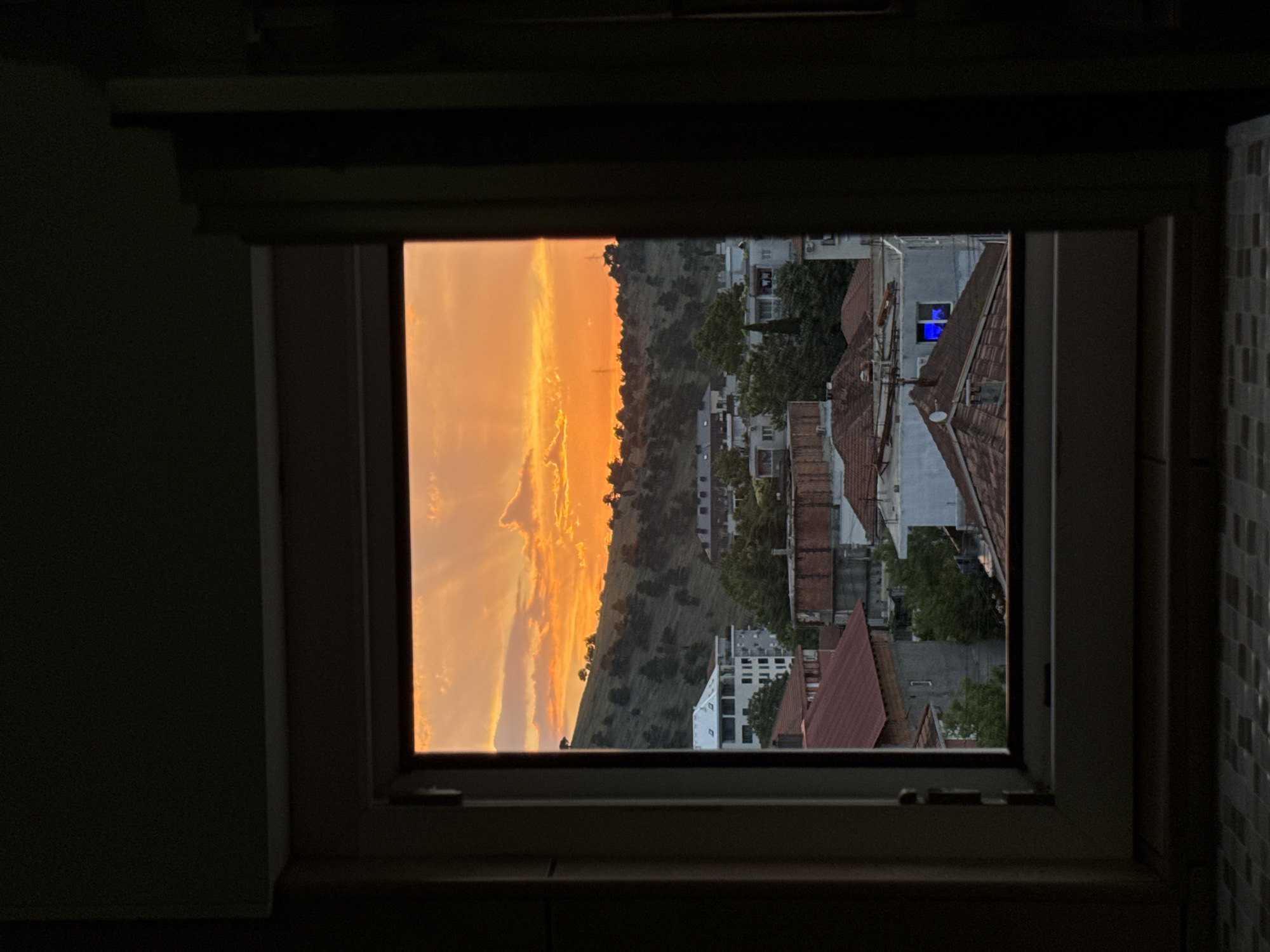 Dramatic sunset illuminates Podgorica sky with vibrant colors