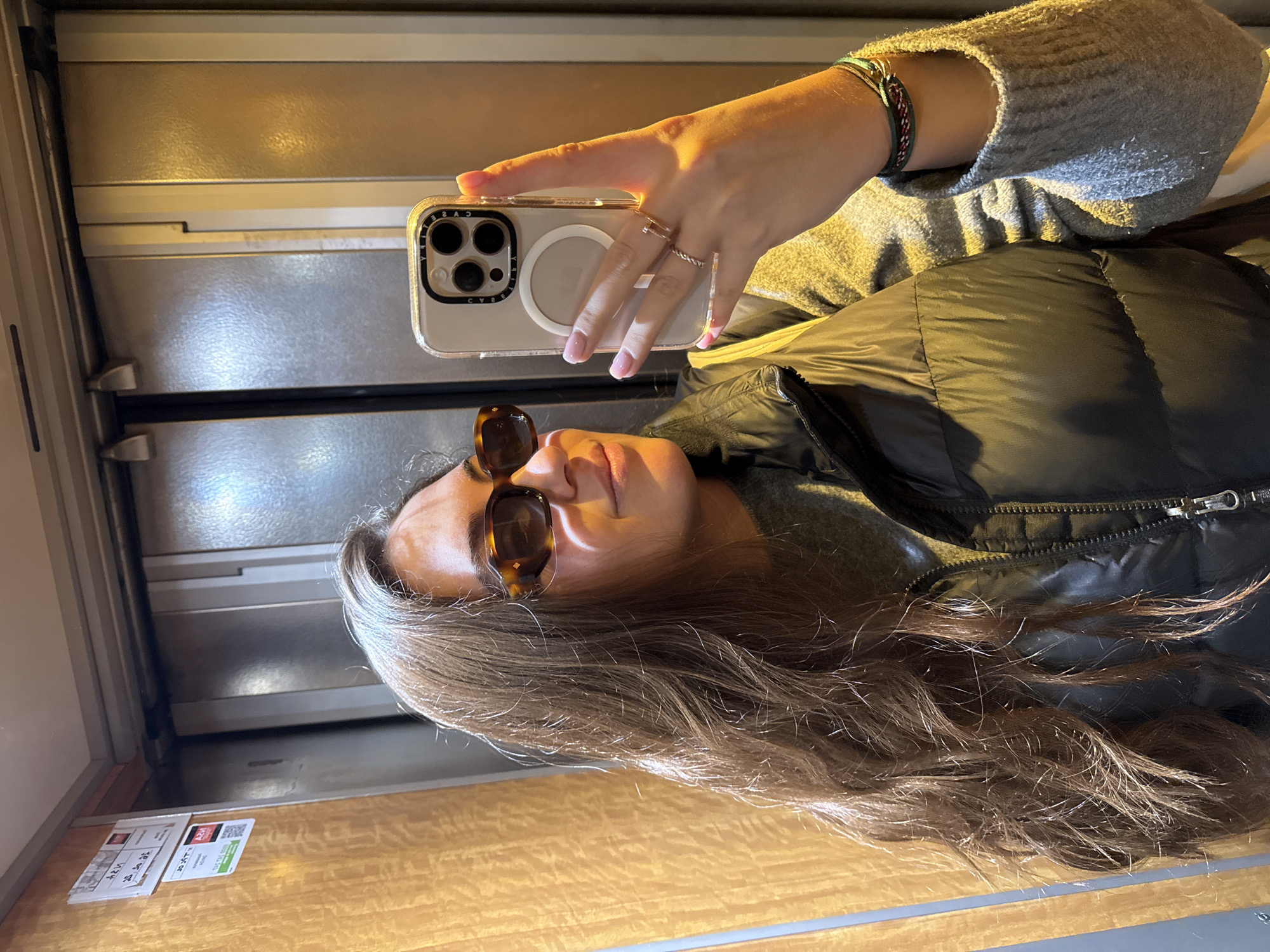 Woman takes selfie on train in Neuilly-sur-Seine