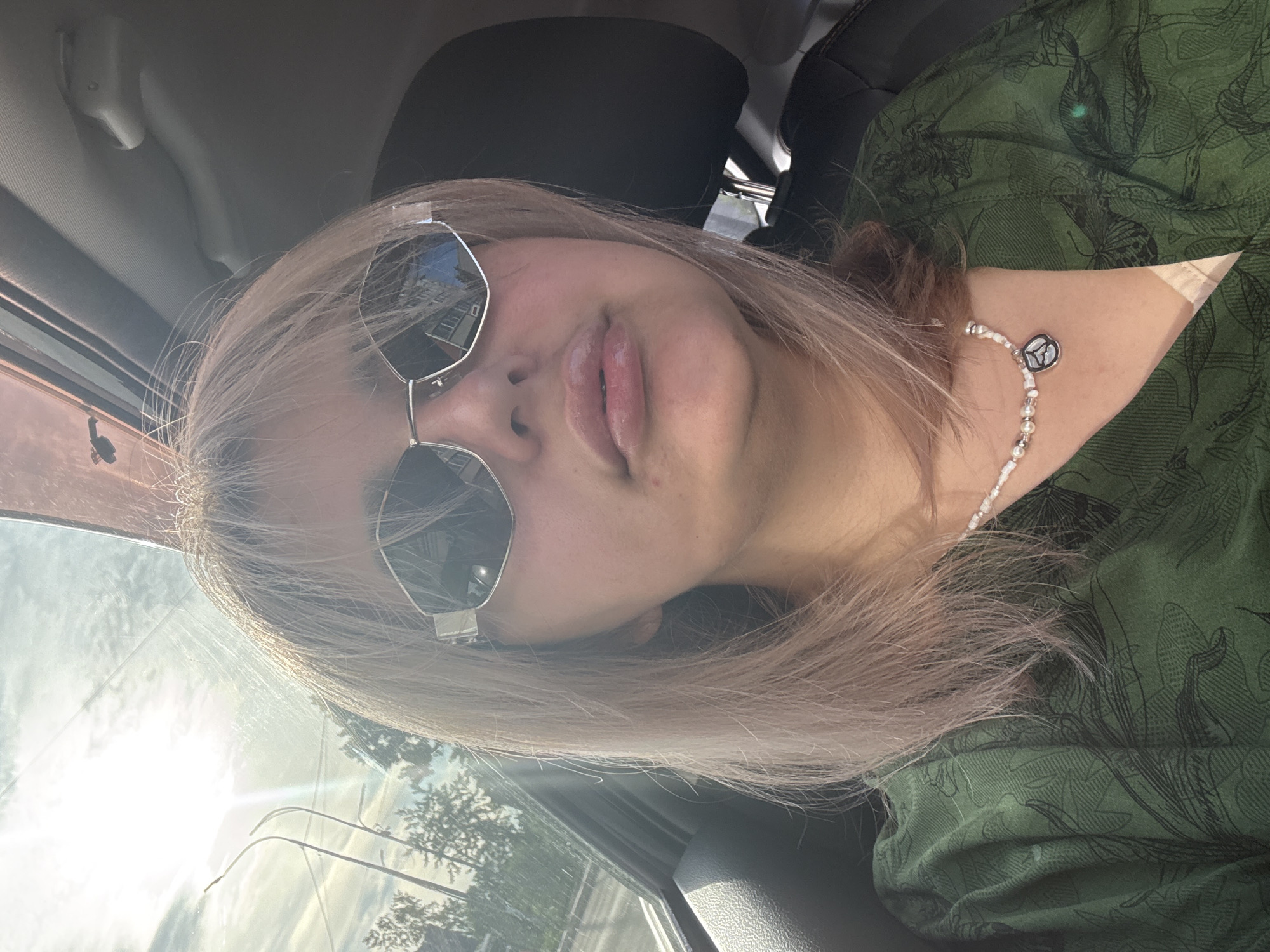 Women Take Morning Selfies in Birobidzhan Cars and Salon