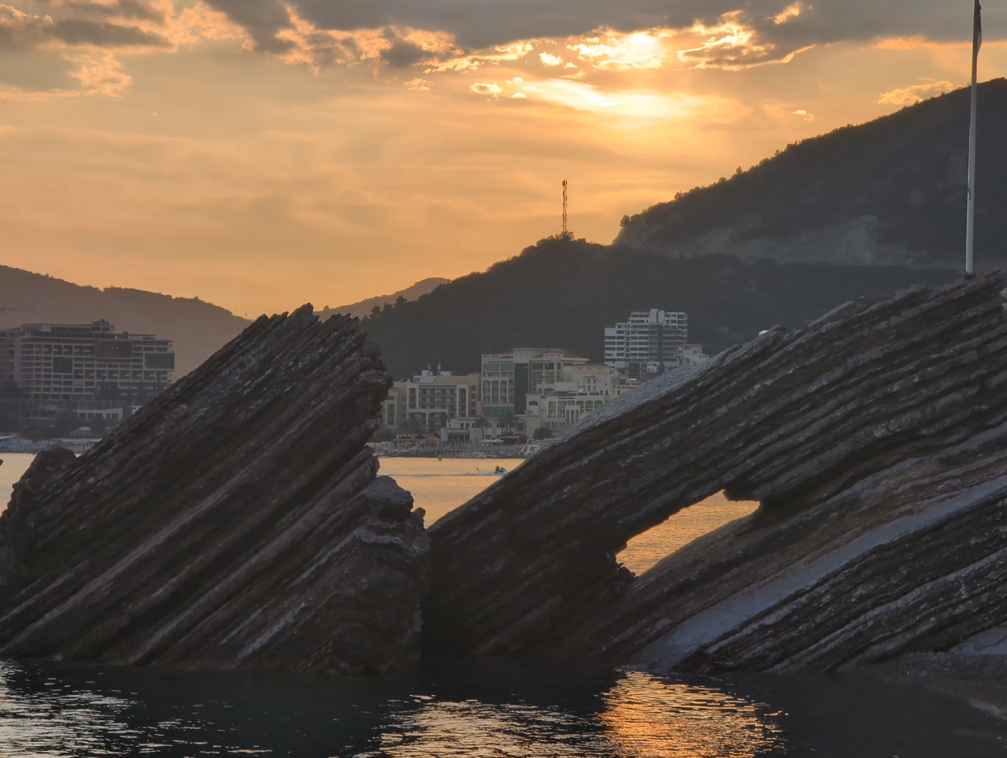 Sunset walk along Rafailovići's rocky Adriatic coastal path