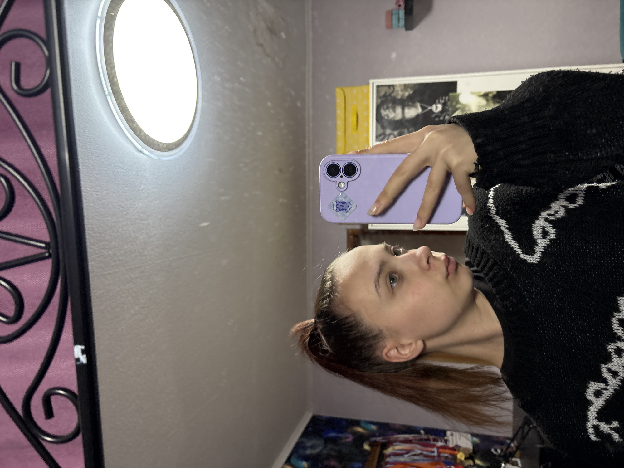 Woman takes selfies in decorated room in Russia