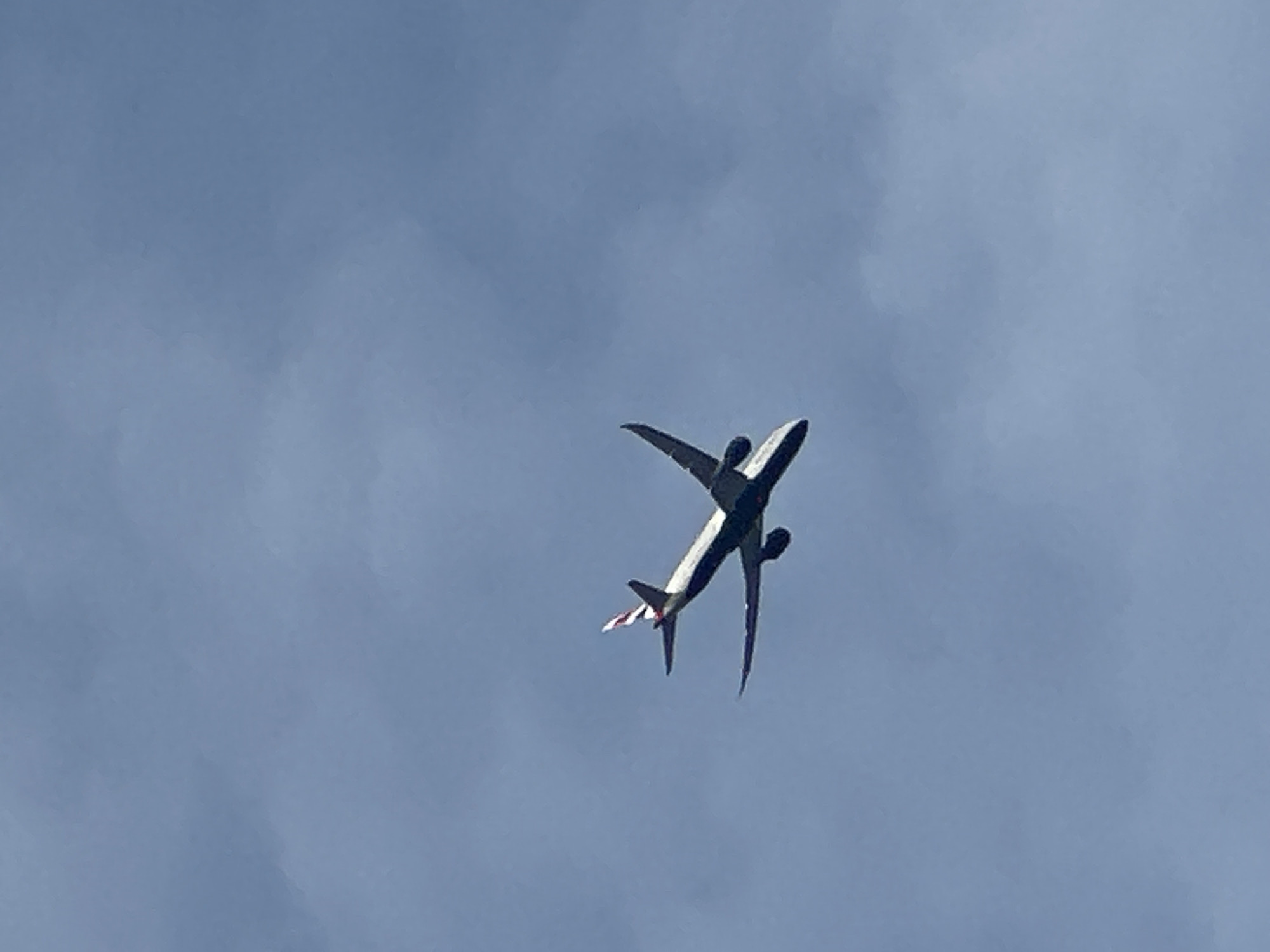 Low-angle views of aircraft overhead in southeast London skies