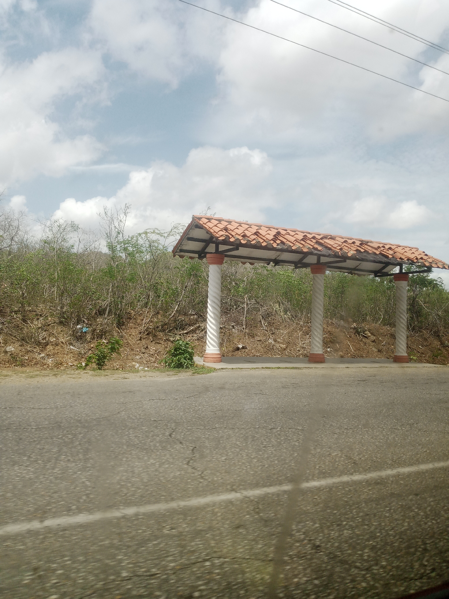 Children's schoolbooks and street scenes from rural Venezuela