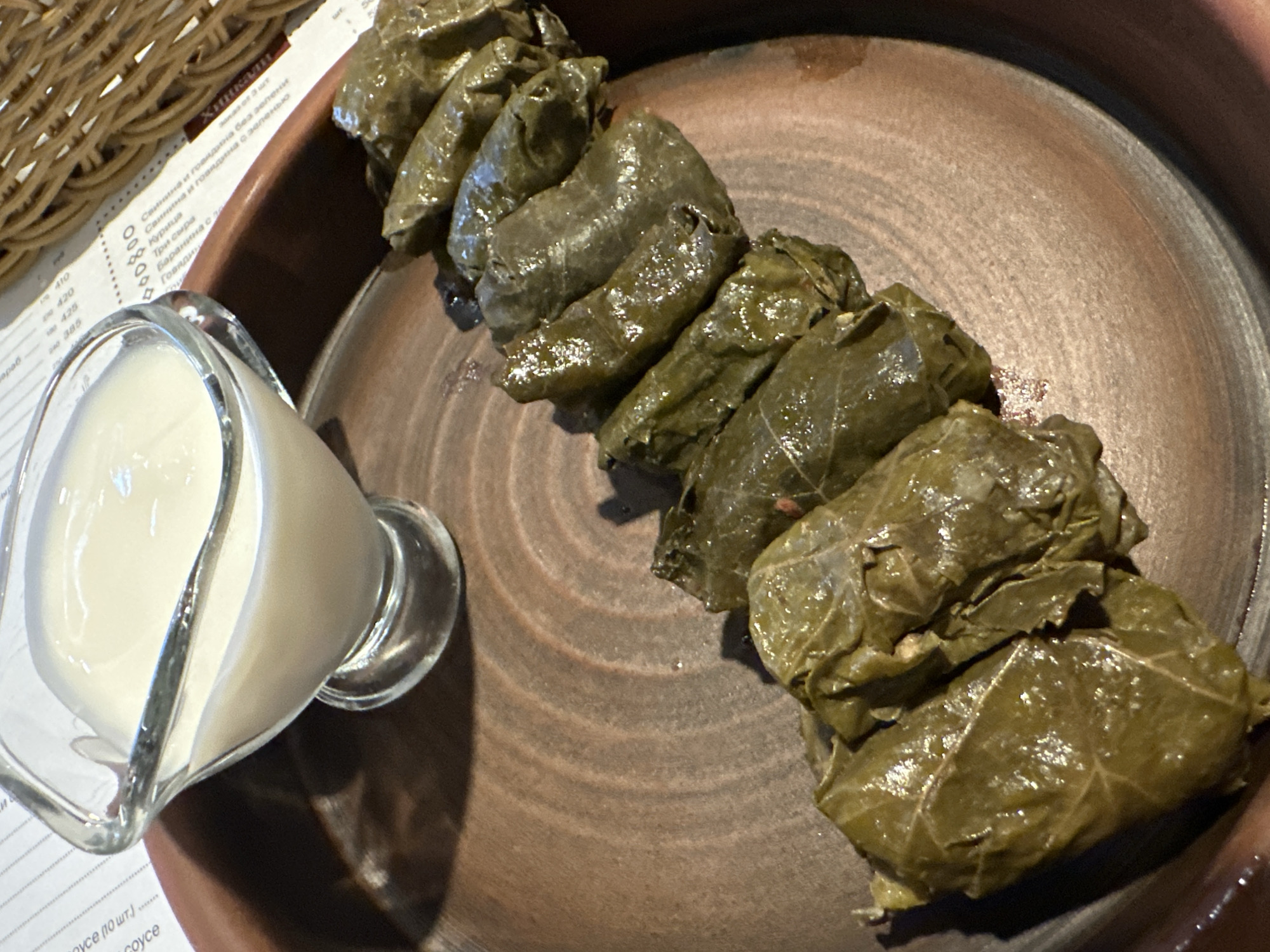 Man enjoys traditional Georgian meal at Saratov restaurant