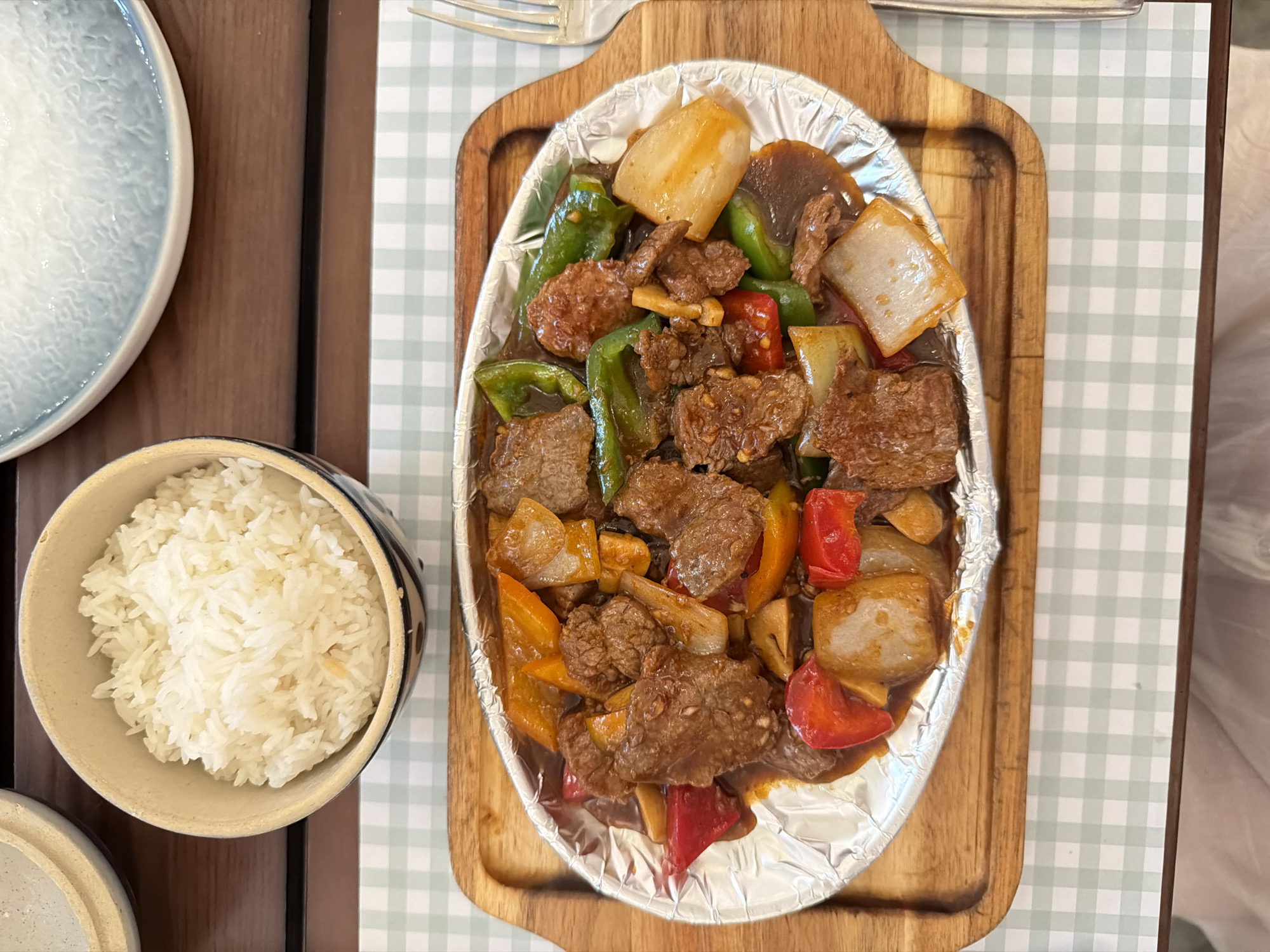 Stir-fried meal documented at Nha Trang dining table