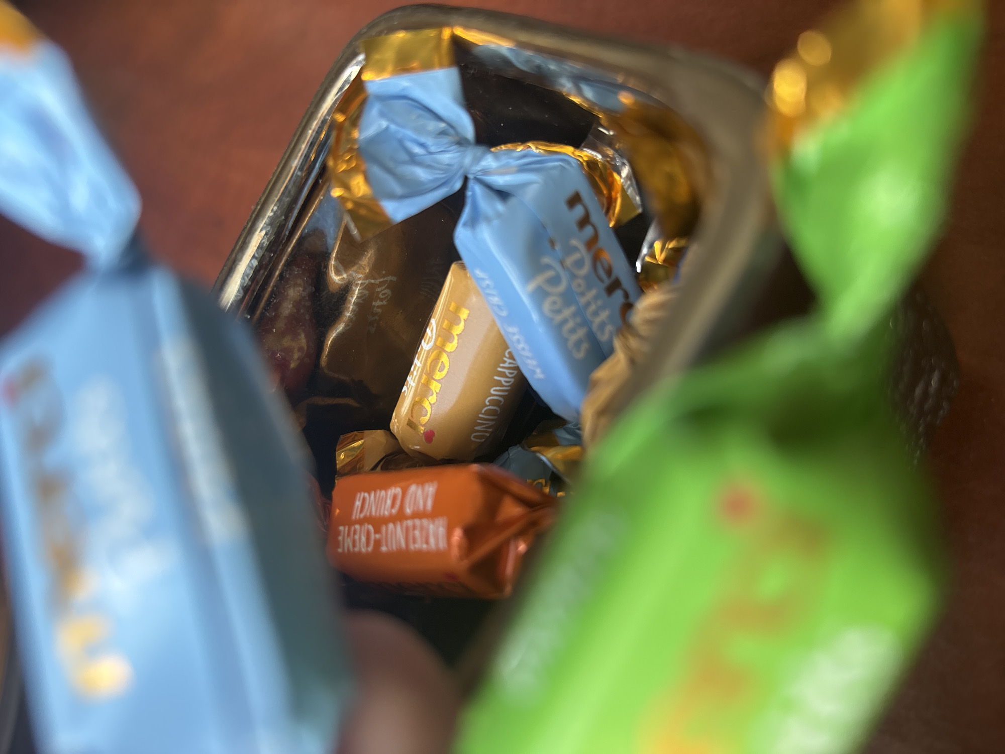 Minsk resident documents chocolate collection in morning candy showcase