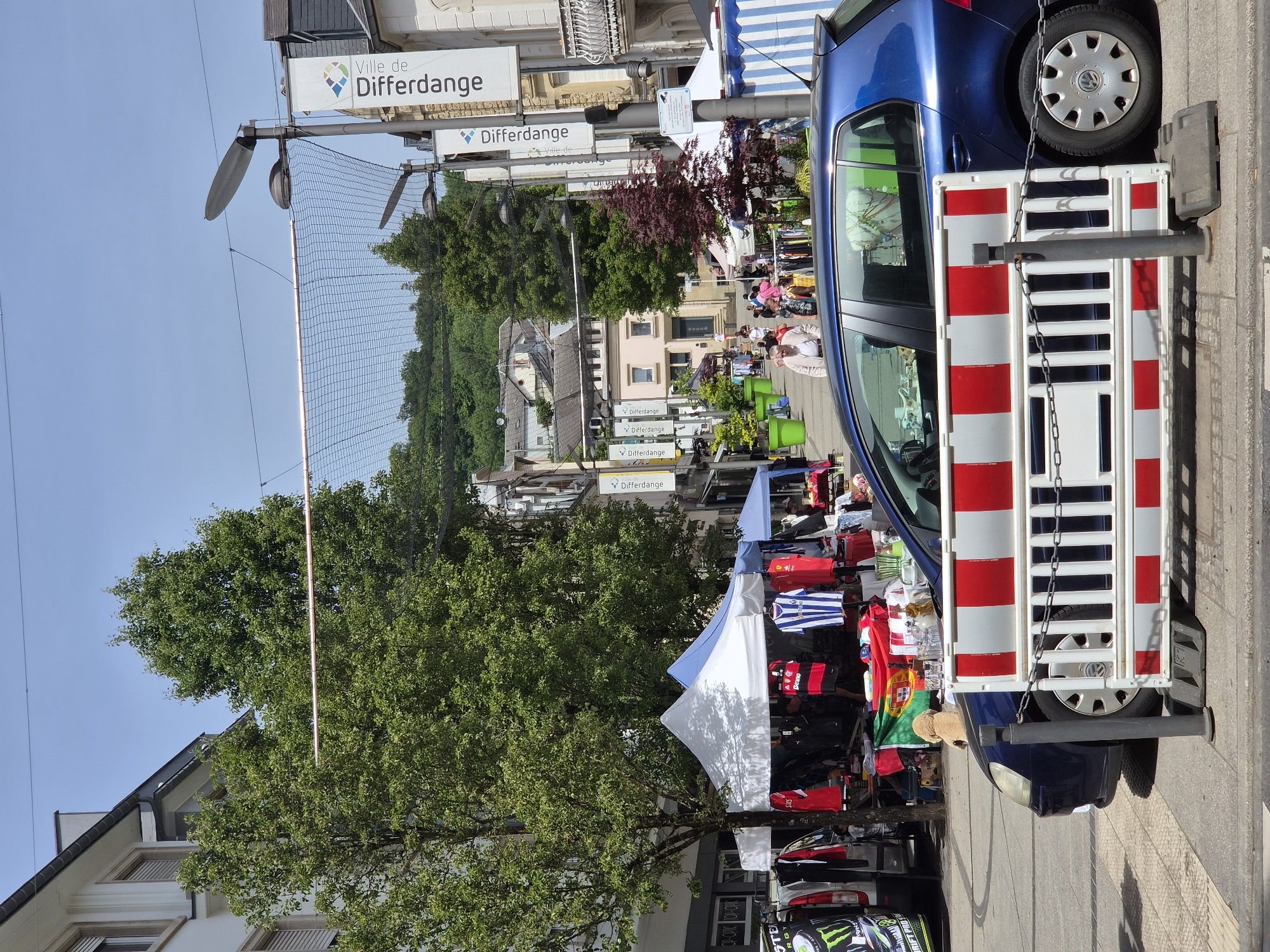 Daily life documented across Differdange, Luxembourg street scenes