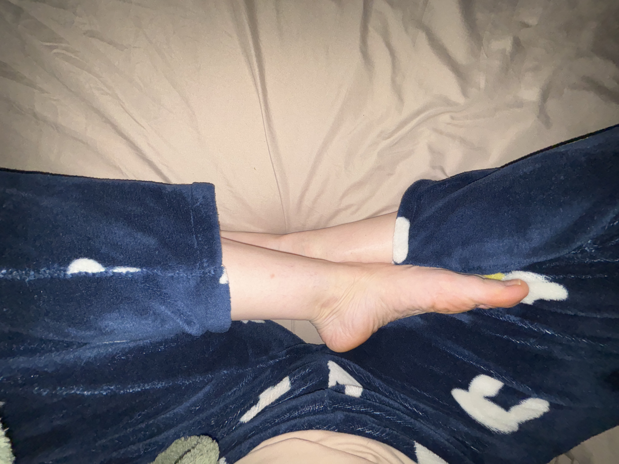 Person in blue pajamas photographed at home in Murino