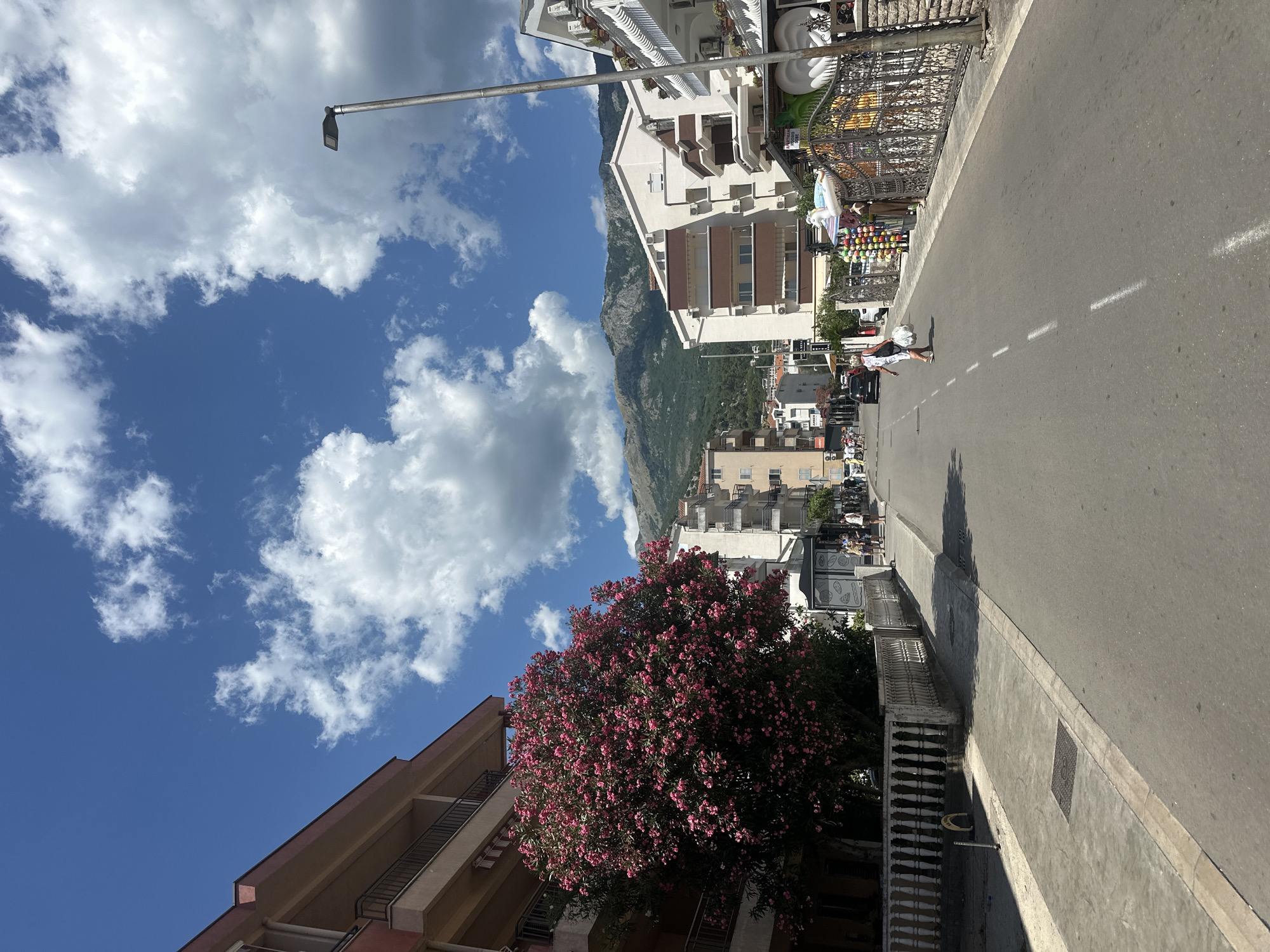 Street-level look at a sunny Budva neighborhood in summer