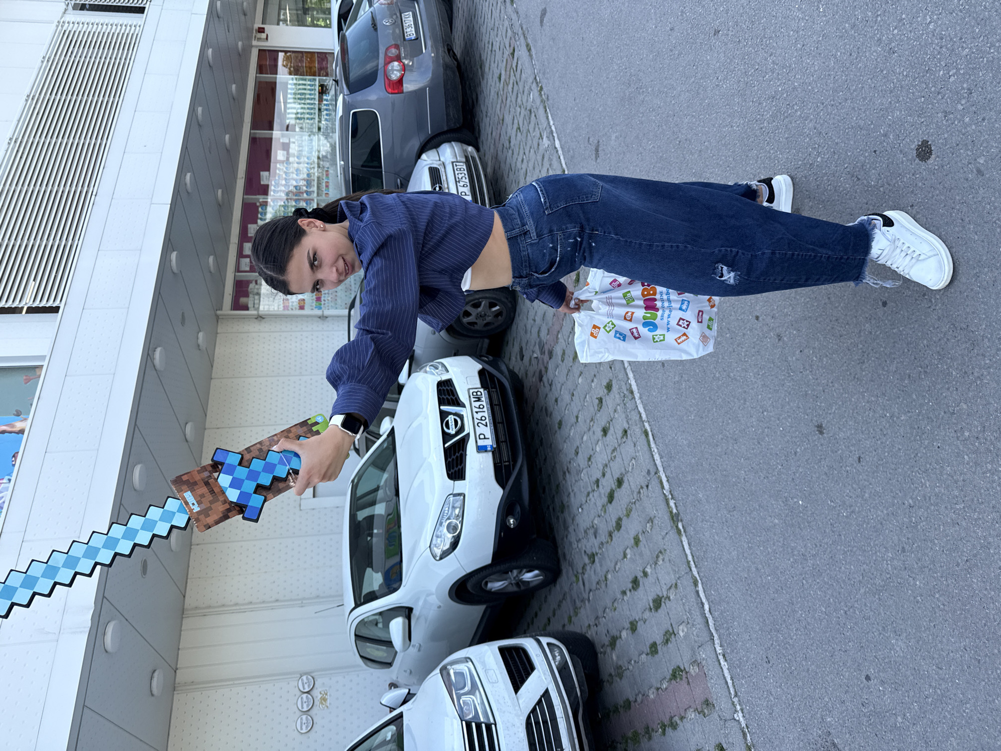 Couple documents shopping trip with props at Jumbo store