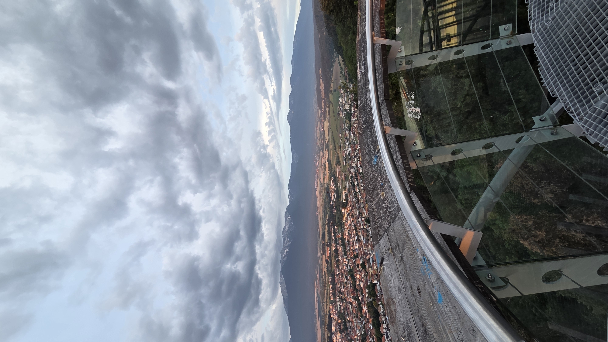 Sunset views from a graffiti-marked lookout above Razlog, Bulgaria
