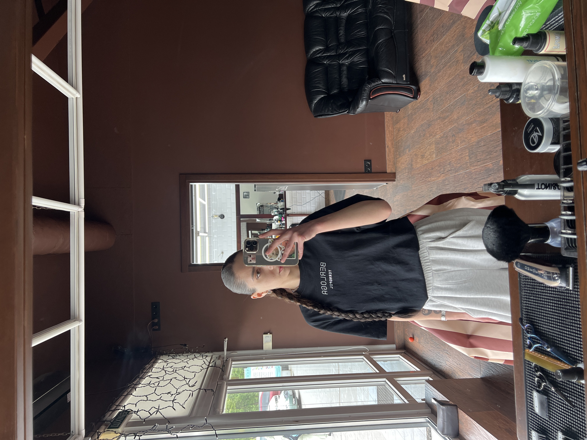 Woman takes selfie at hair salon in Ternopil