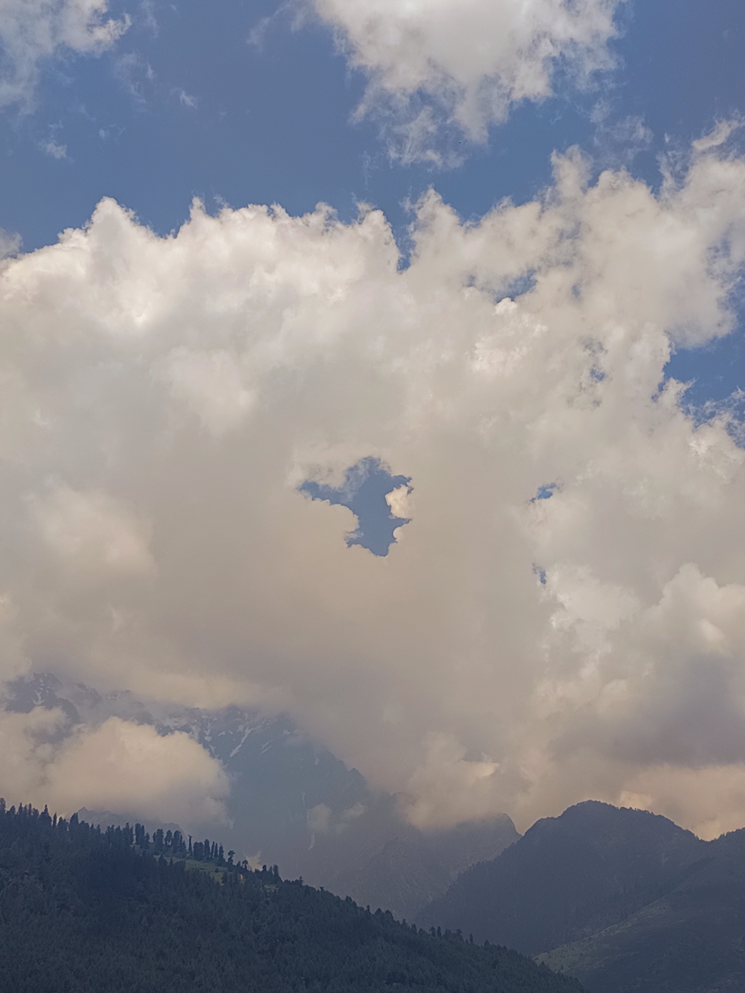 Dramatic Himalayan skies over Vashisht captured from ground and air