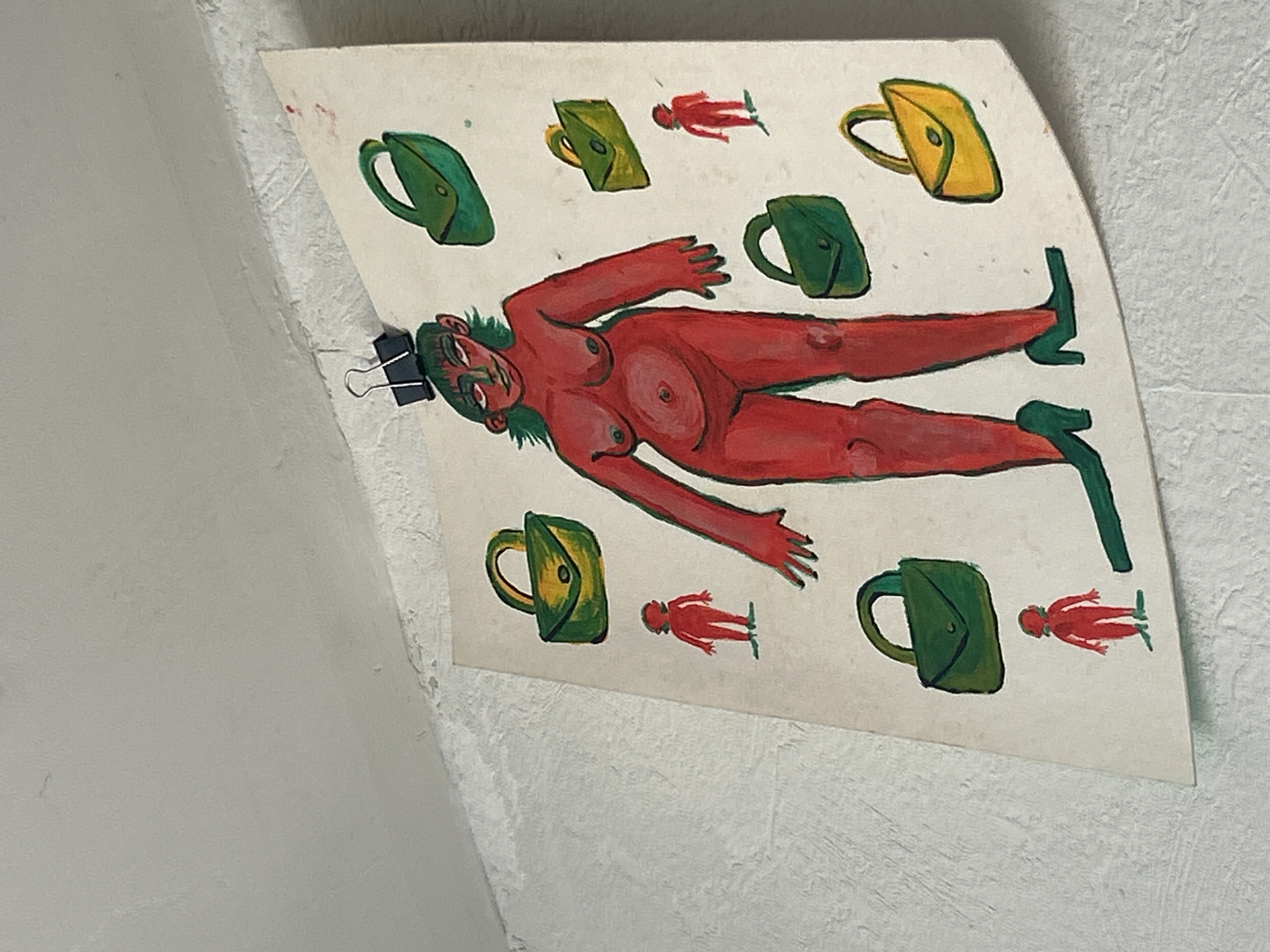 Interior artistic space documented with paintings, decorations, vintage poster