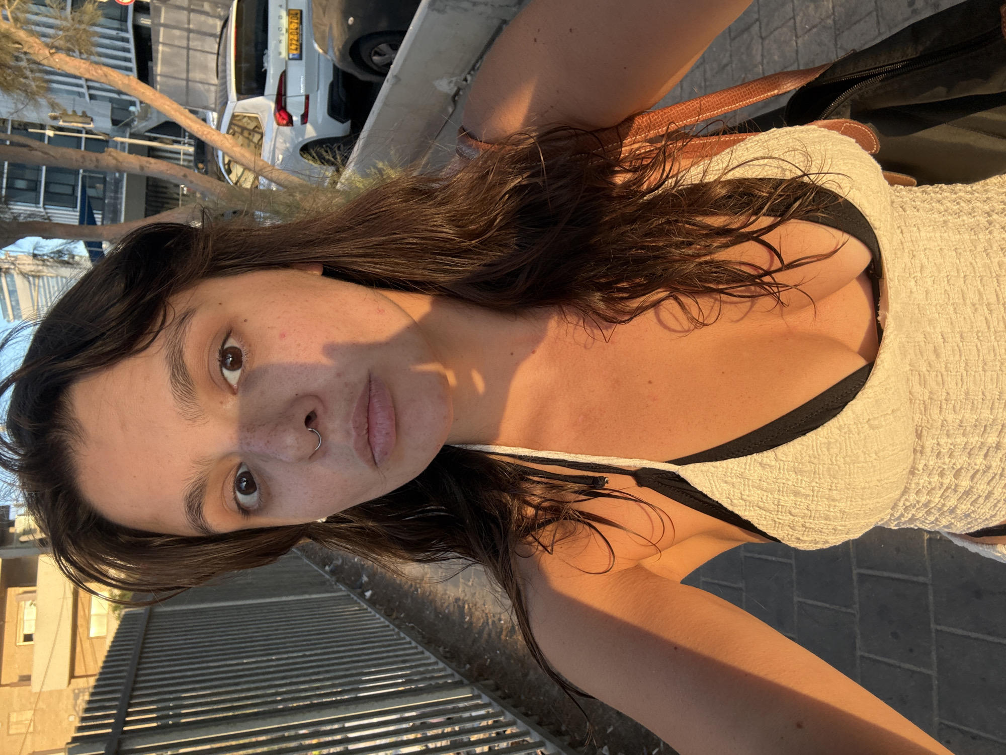 Tel Aviv promenade at golden hour, selfie and skyline