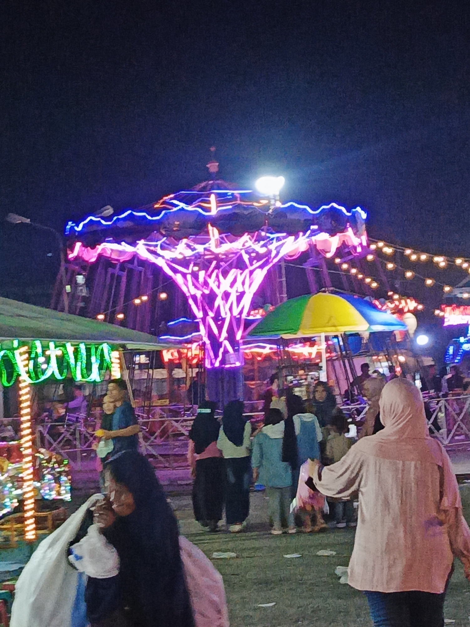 Lhokseumawe night market: carnival rides, street food, and stalls