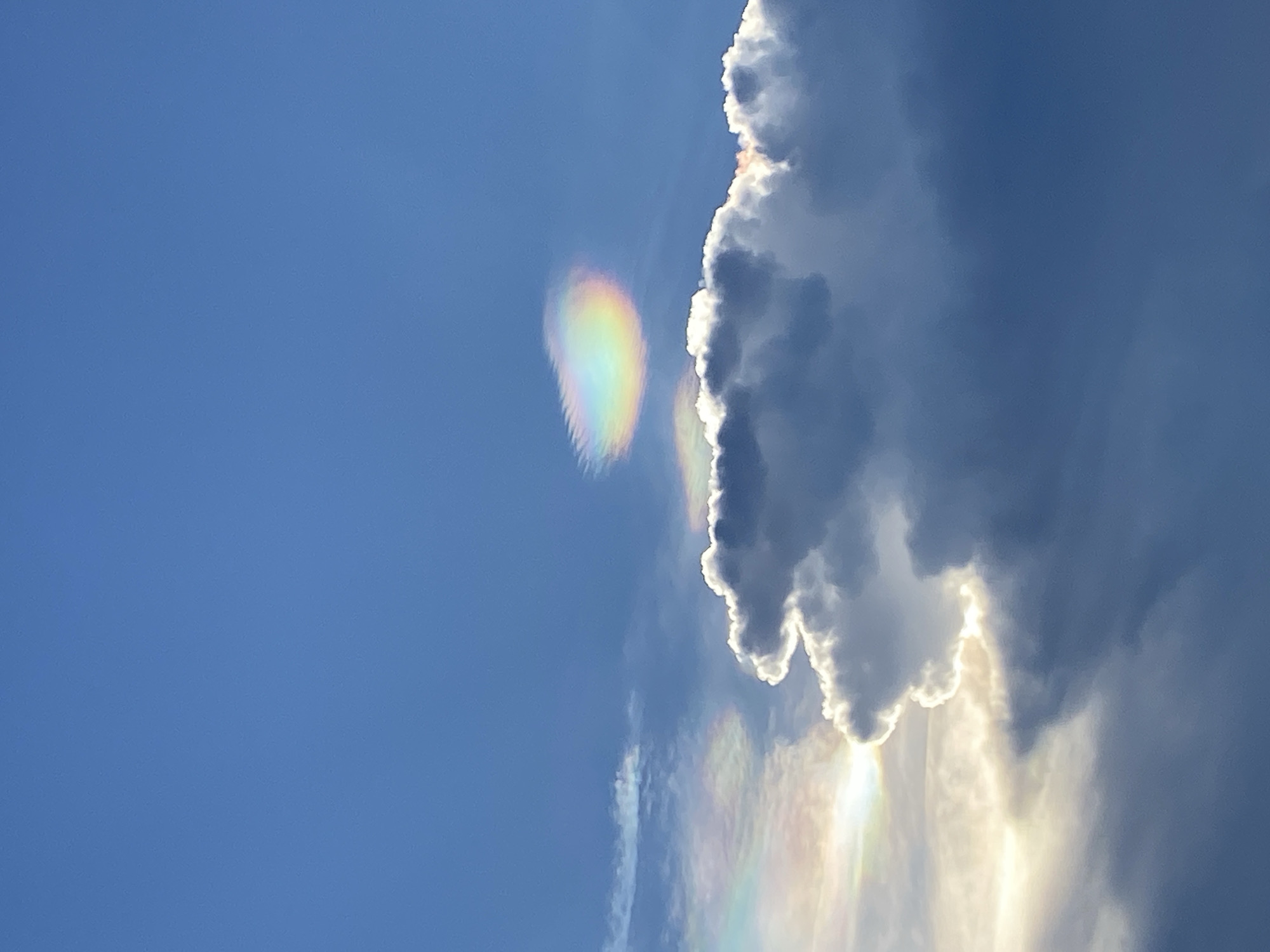 Women Take Selfies During Rainbow Display at Mui Ne Beach