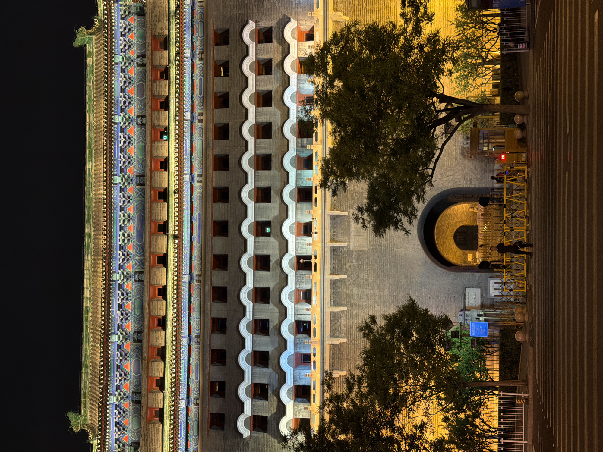 Nighttime view of imperial Chinese gate structure captured