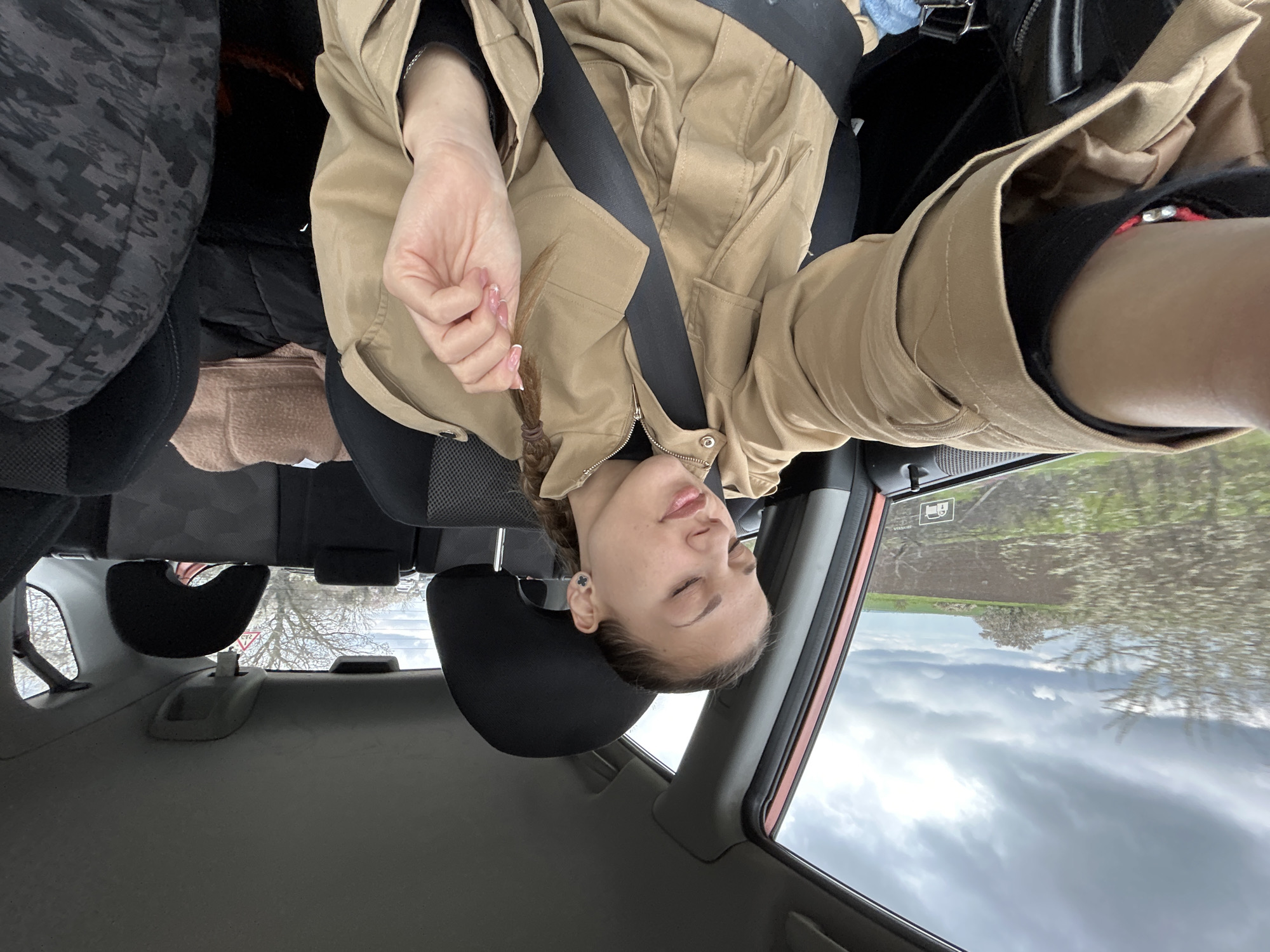 Woman passenger observed in moving car in Trastenik