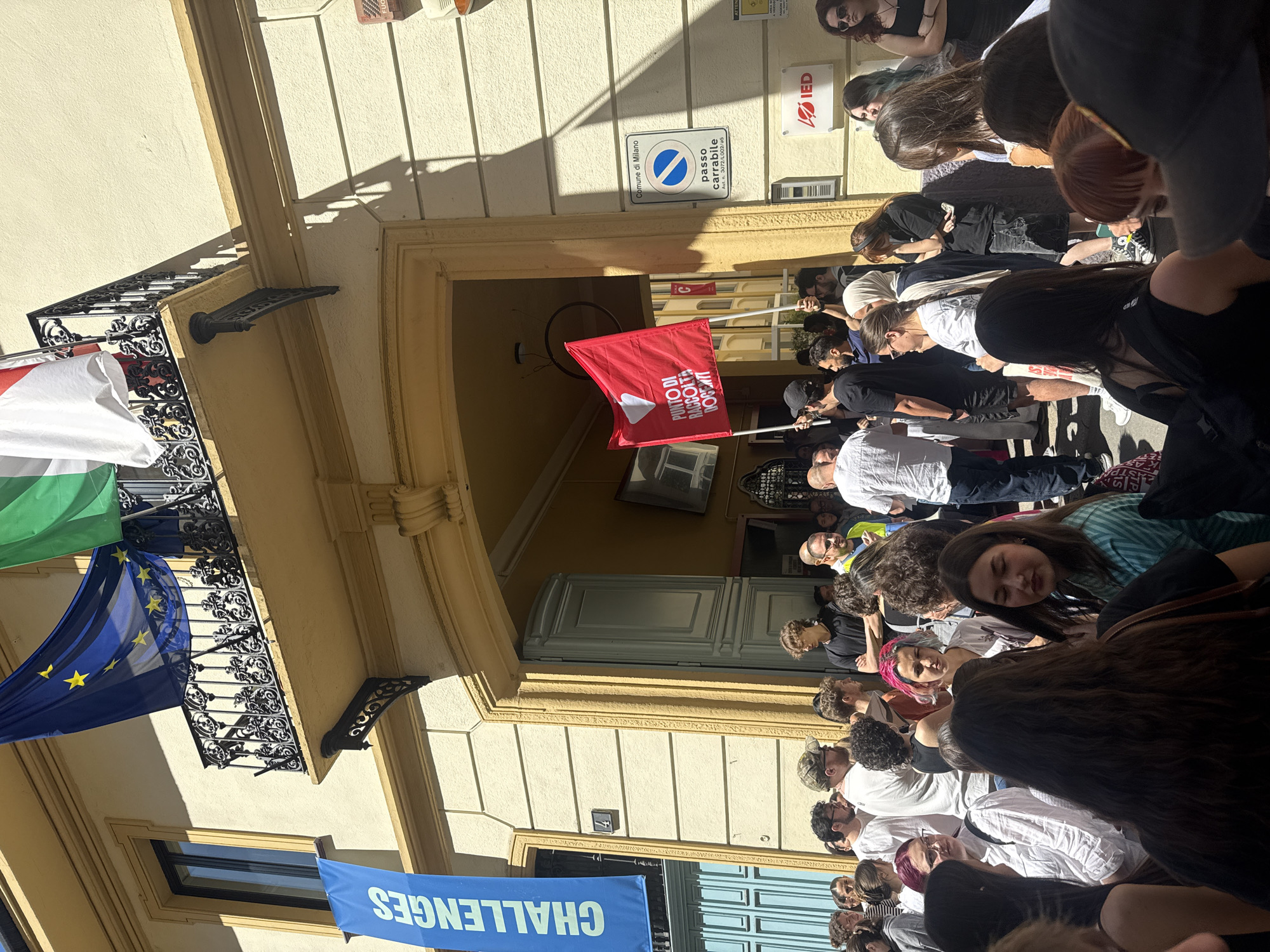 Milan street life and workshop activities captured Thursday morning