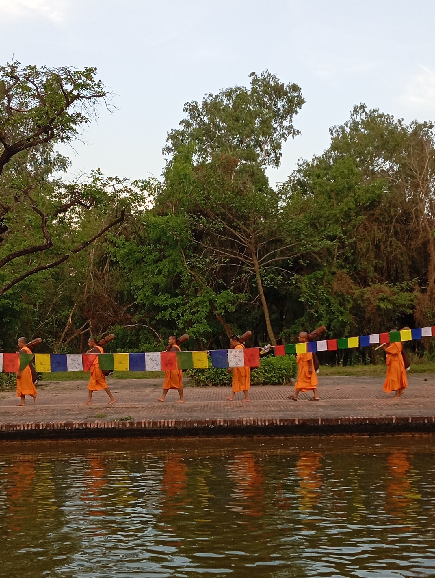 Buddhist monks process through sacred Lumbini site in Nepal