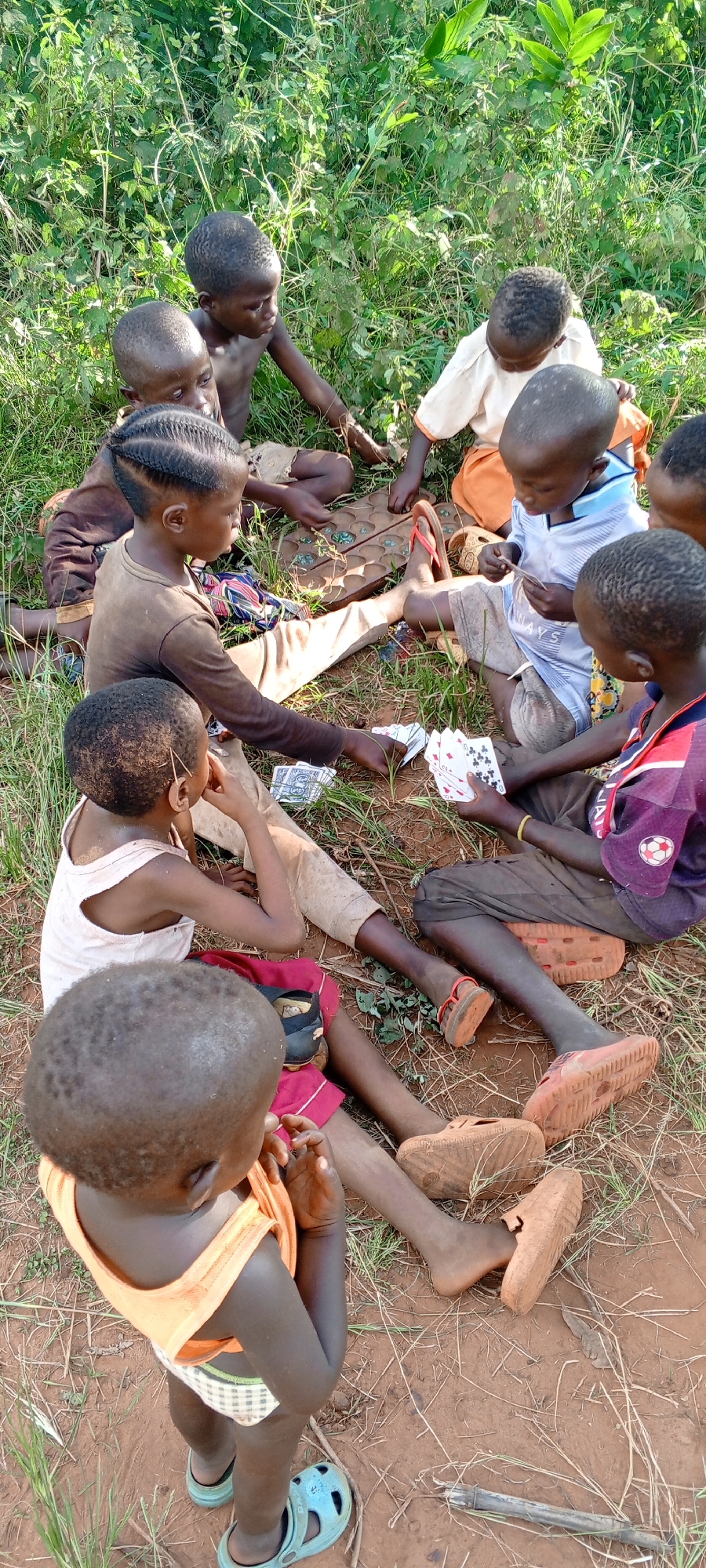 Children play traditional games in rural Democratic Republic Congo