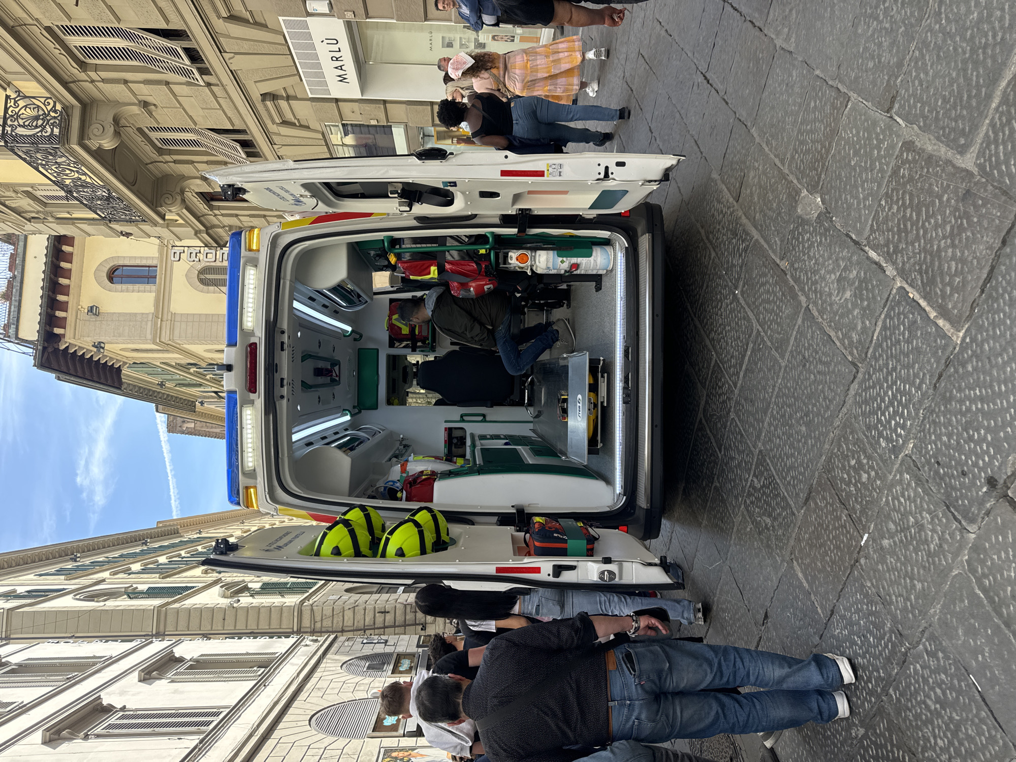 Tourist documents Florence Cathedral crowds during midday visit