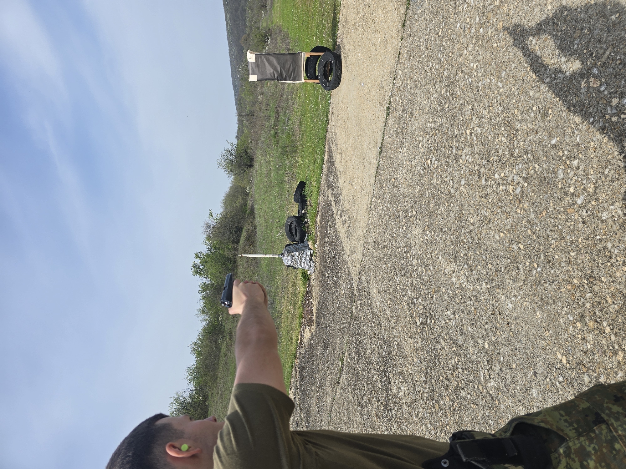 Man practices at outdoor shooting range in Beliakovets, Bulgaria