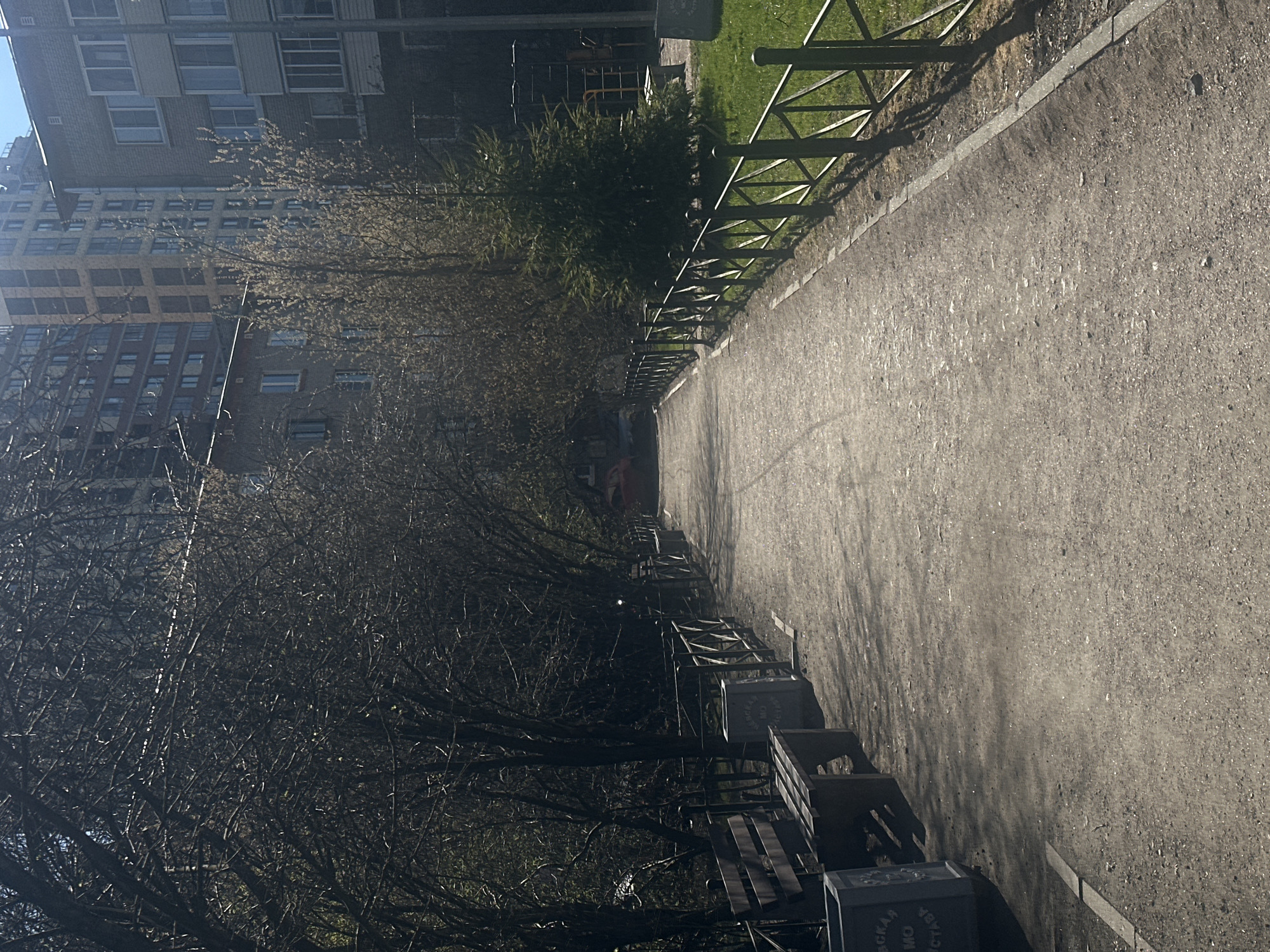 Pedestrian walkway with metal fencing observed in Saint Petersburg