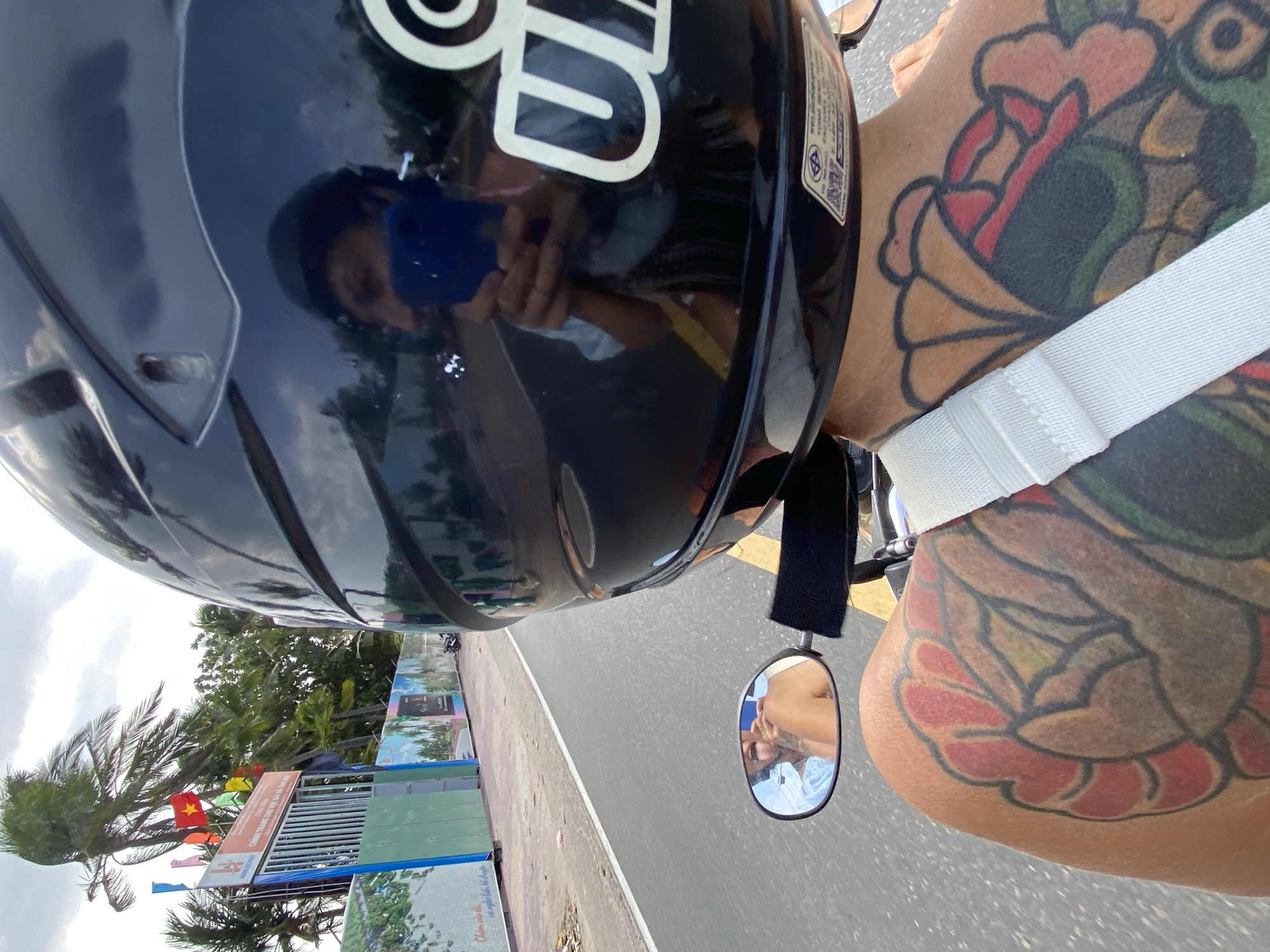 Motorcycle riders travel through Phu Thuy Ward streets