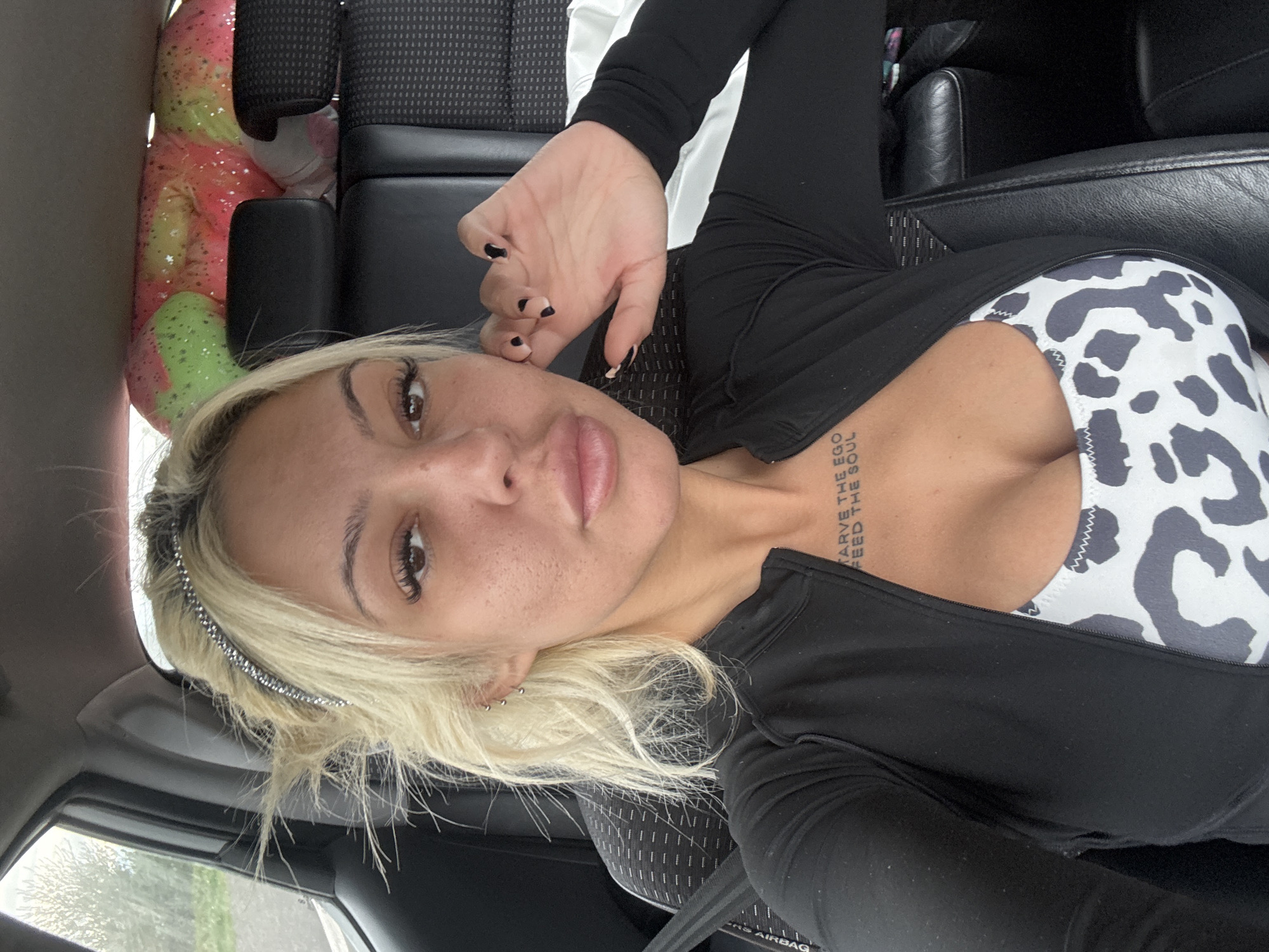 Woman takes car selfie in Shtarkovo, Bulgaria