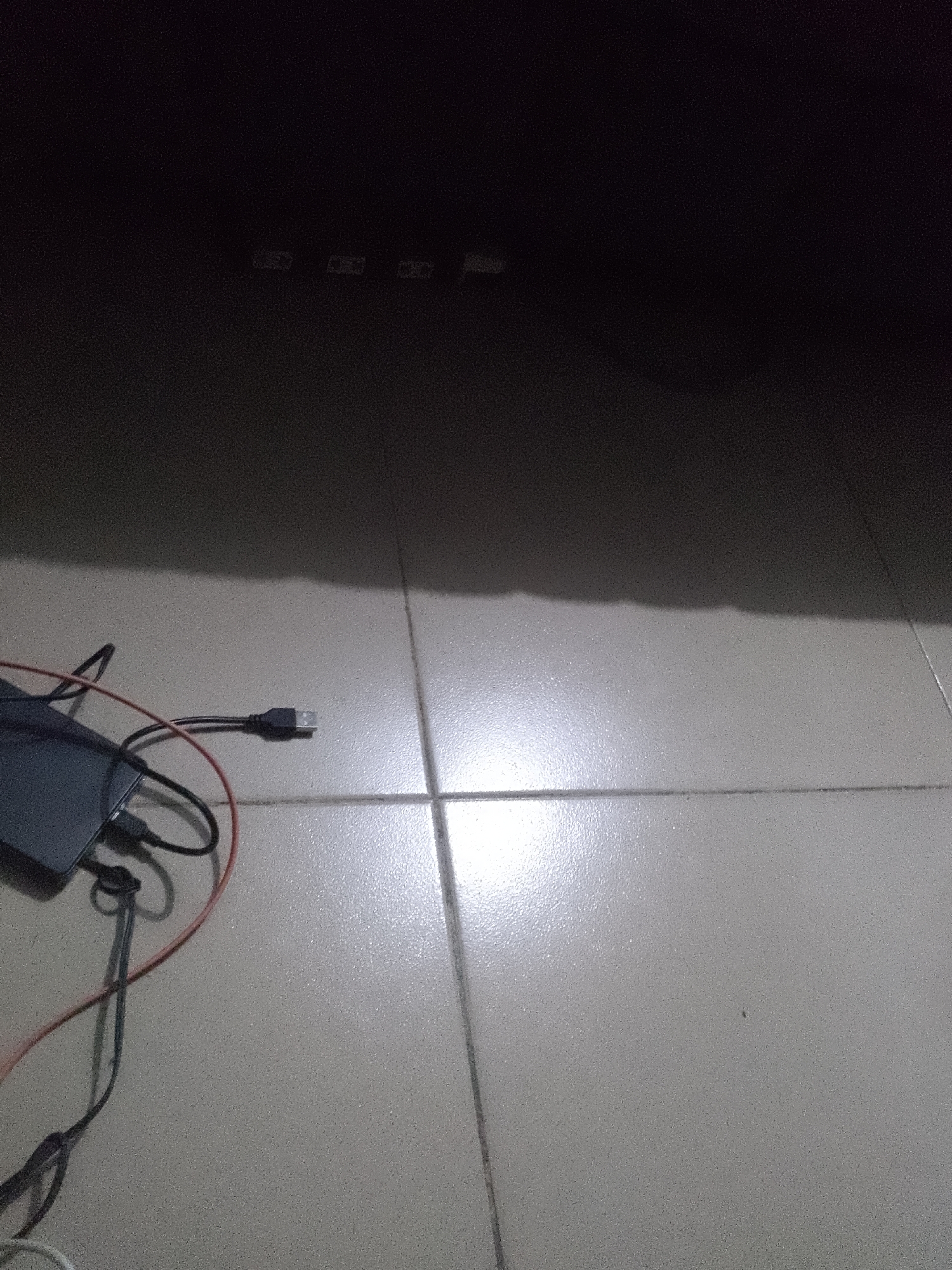 Witness documents ordinary evening domestic life in dimly lit rooms