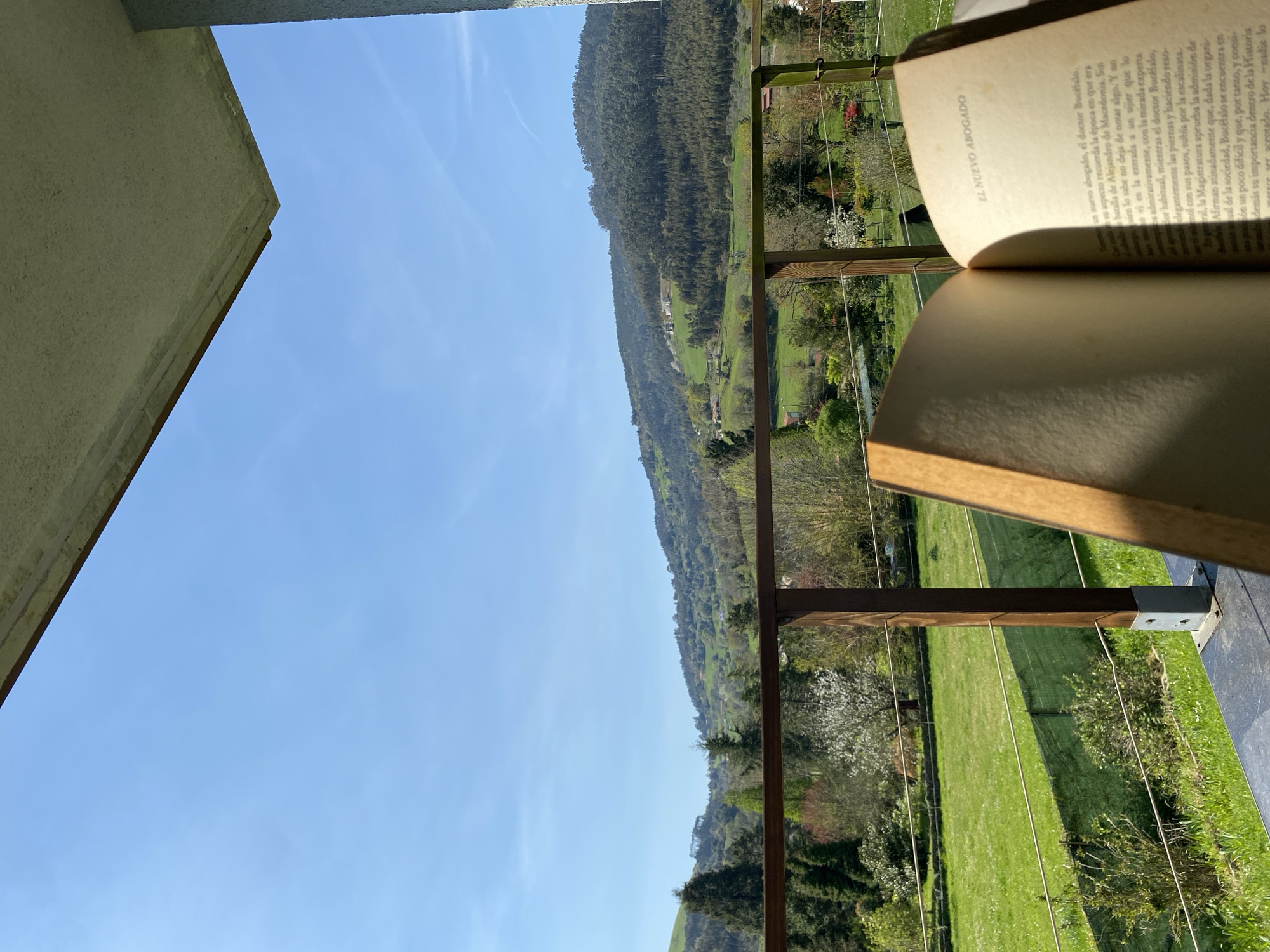 Quiet Saturday morning documented on residential balcony in Villaviciosa