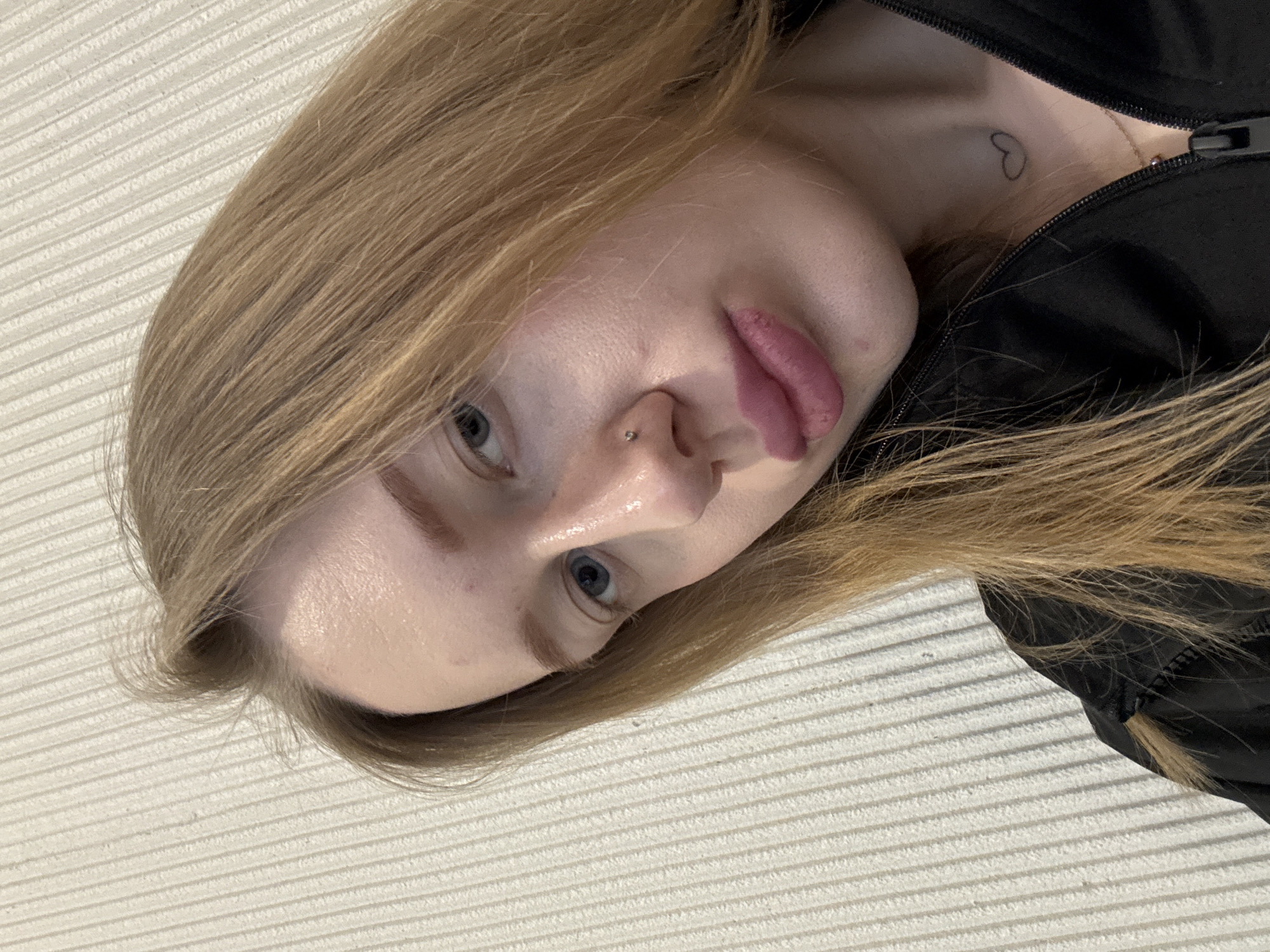 Portrait photos of pierced blonde woman captured in Ovoshchnoy