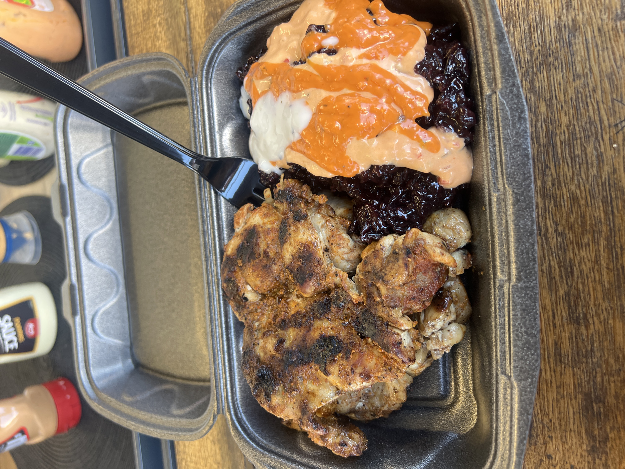 Takeout meal photographed on wooden table in Burgas, Bulgaria