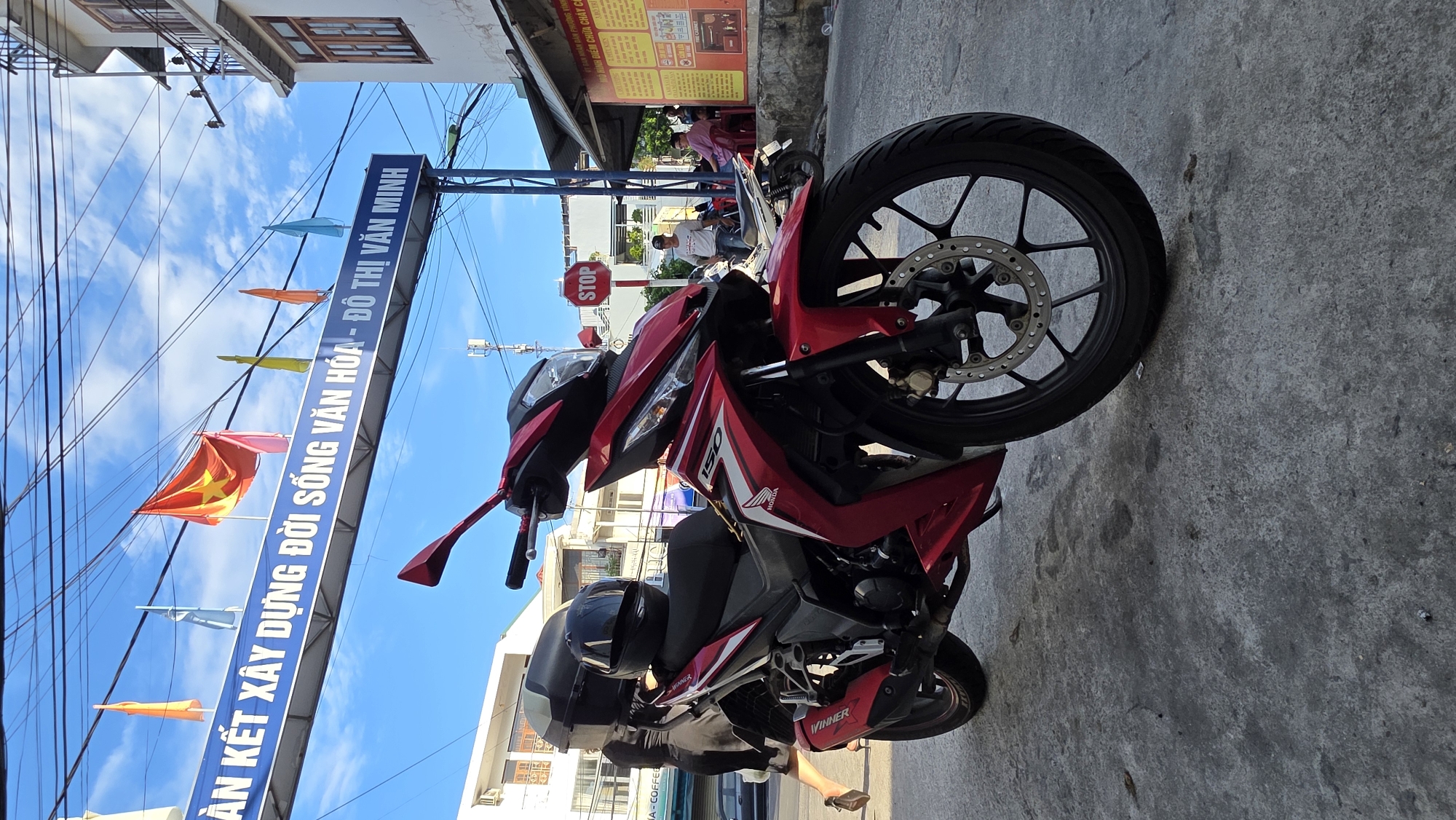 Nha Trang street scenes: motorcycles, overhead wires, and midday life