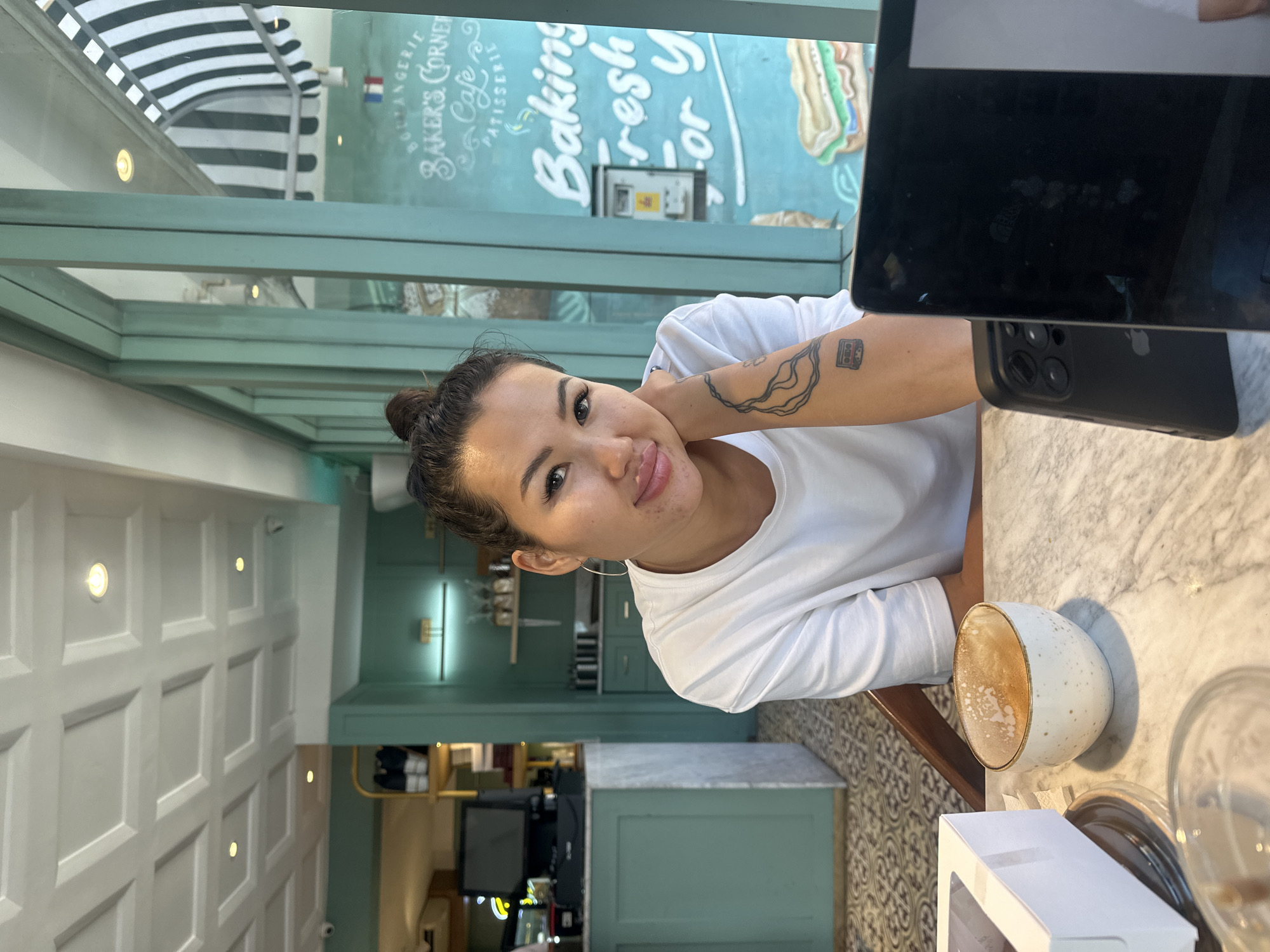 Cafe break in North Kuta with éclairs and marble tables