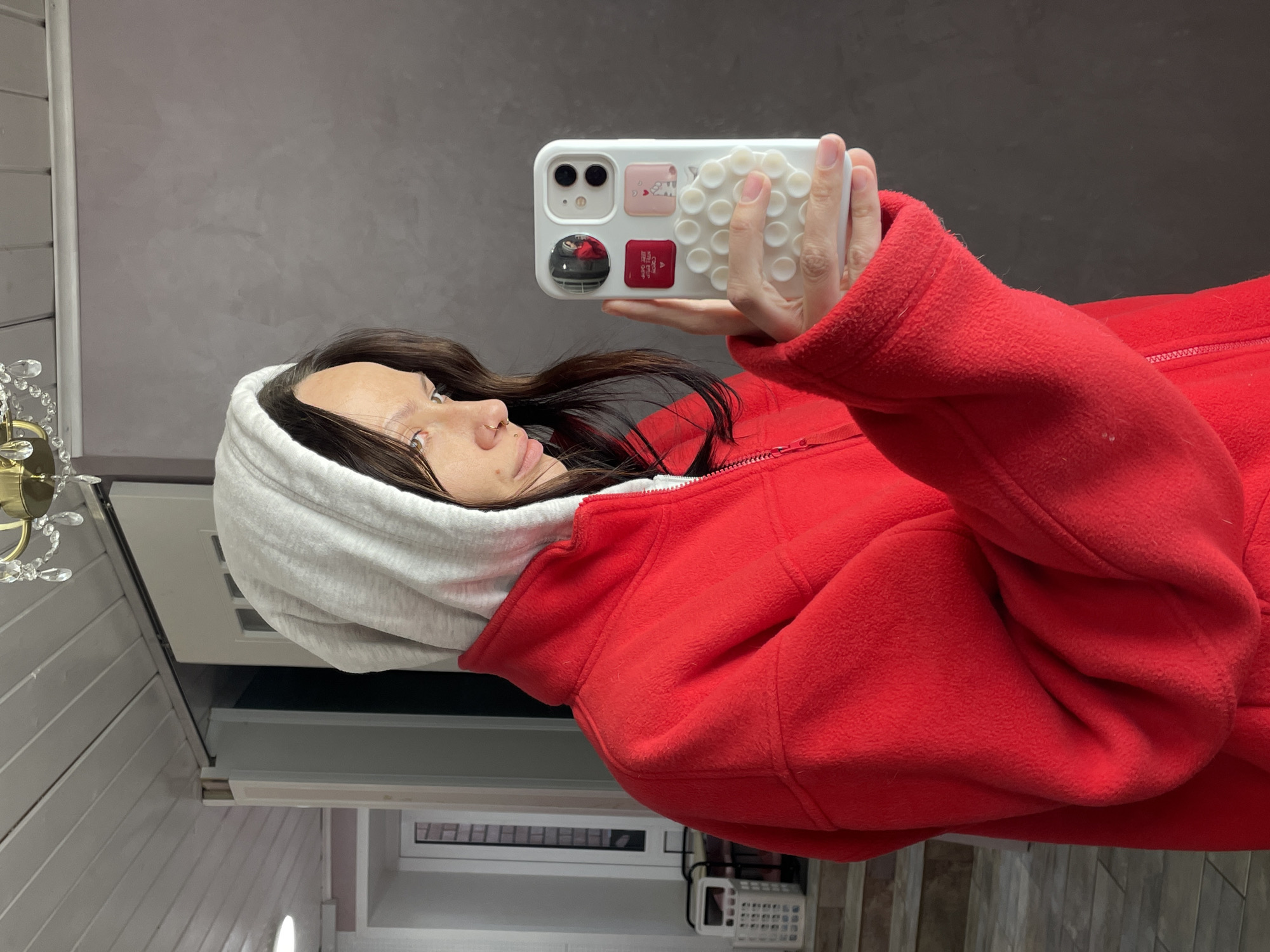 Woman takes selfie indoors in Izhevsk, Russia