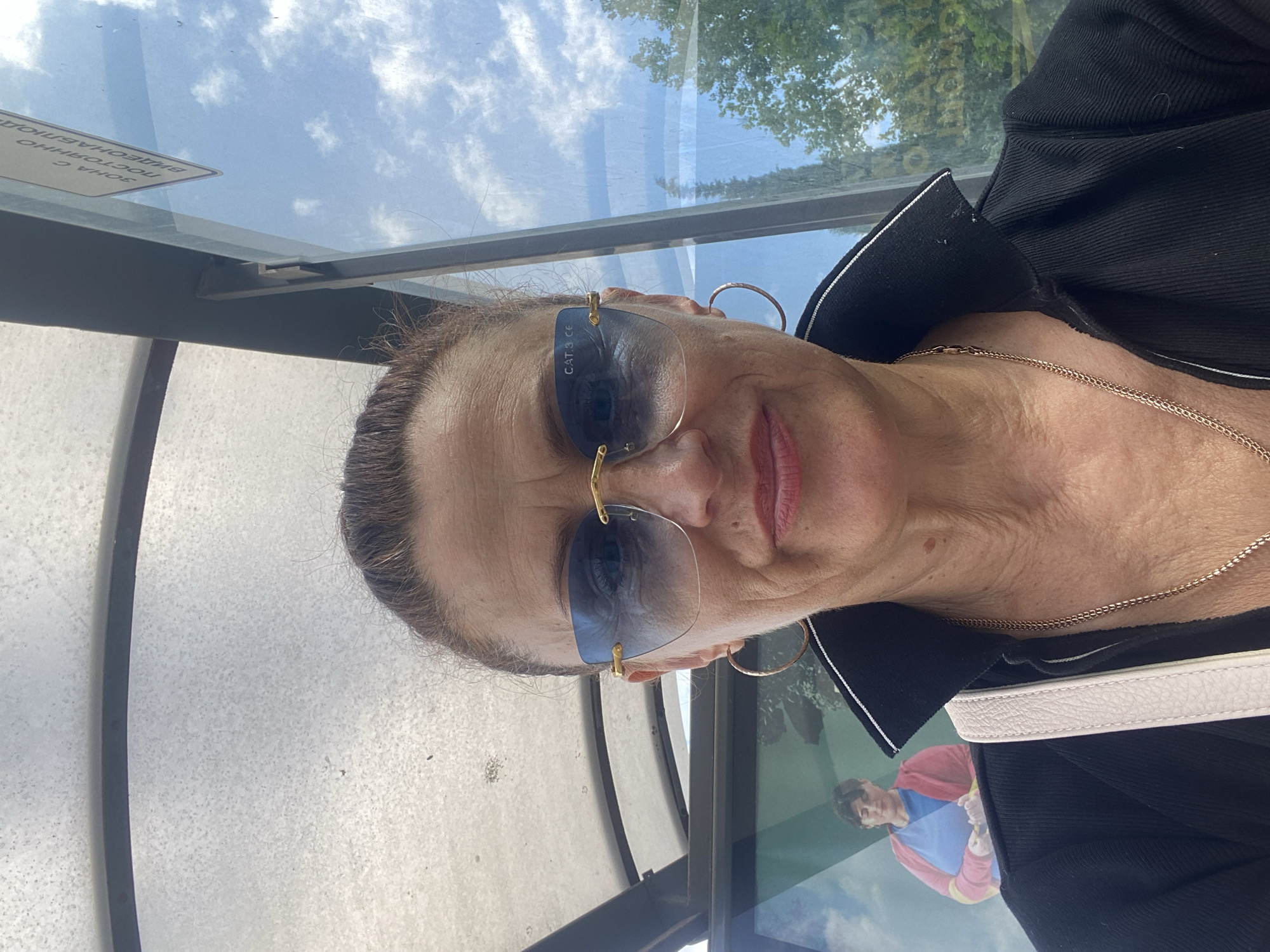 Waiting at a Burgas bus stop on a quiet summer afternoon