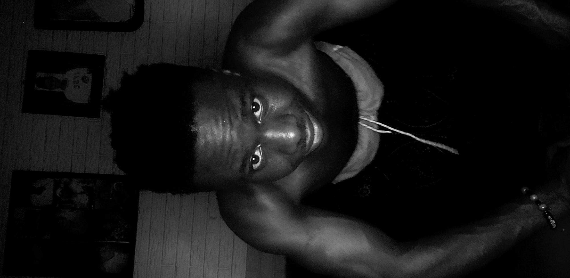 Man photographed in multiple poses in Narayi Nigeria room