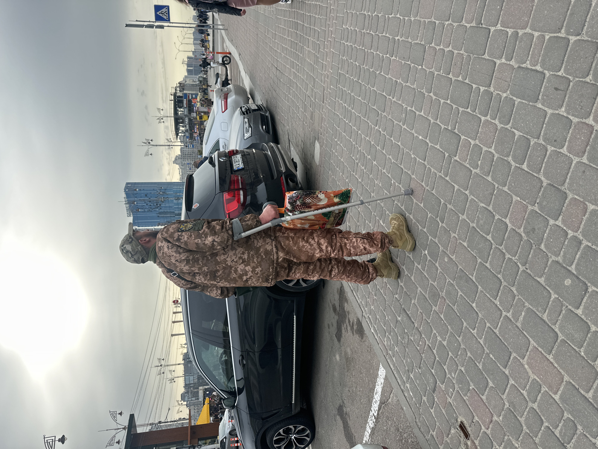 Morning street life documented across Kyiv locations