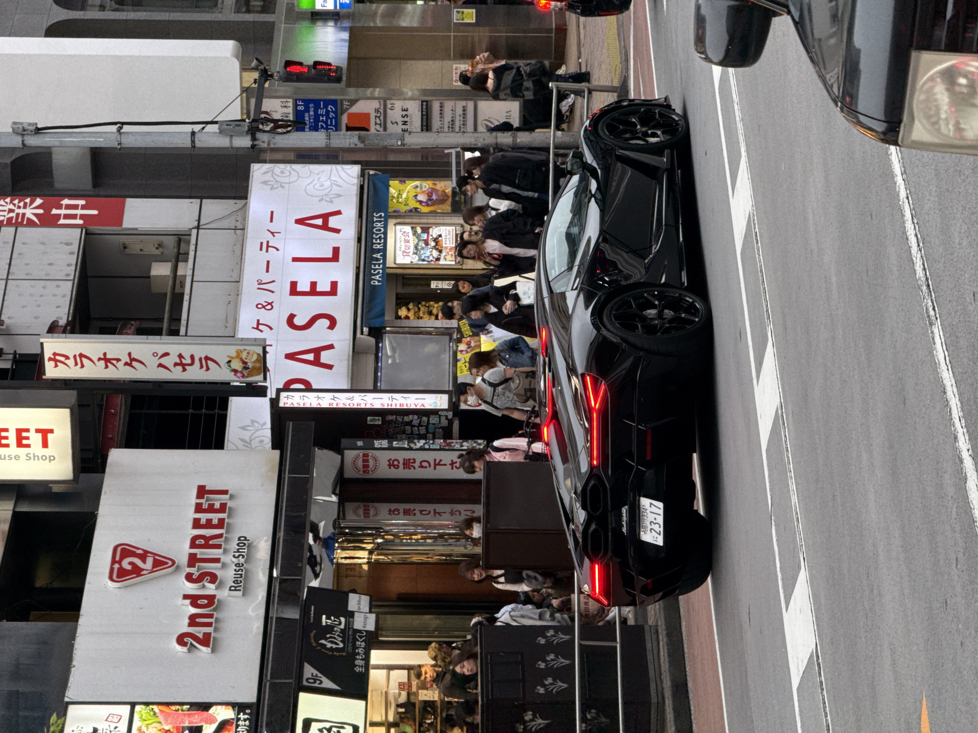 Morning street activity documented in bustling Shibuya district