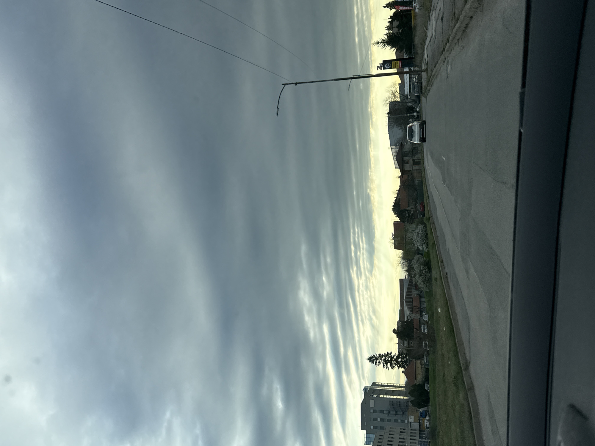 Morning commute observed in Sofia under patterned overcast skies