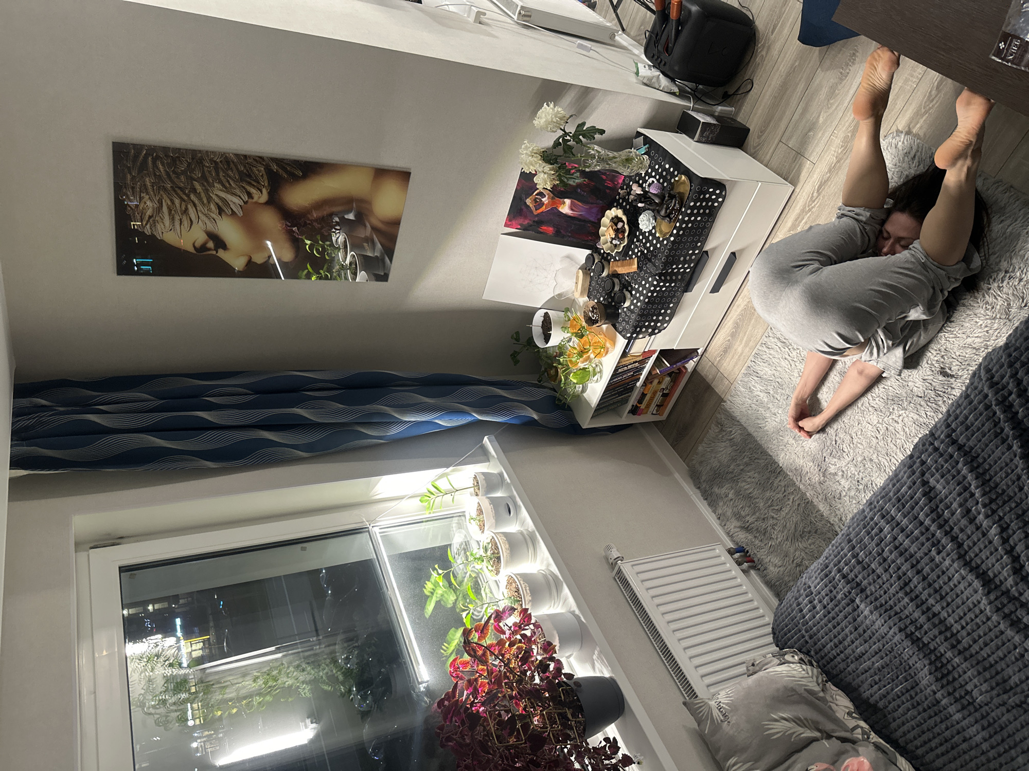 Woman photographed resting in apartment during evening in Murino