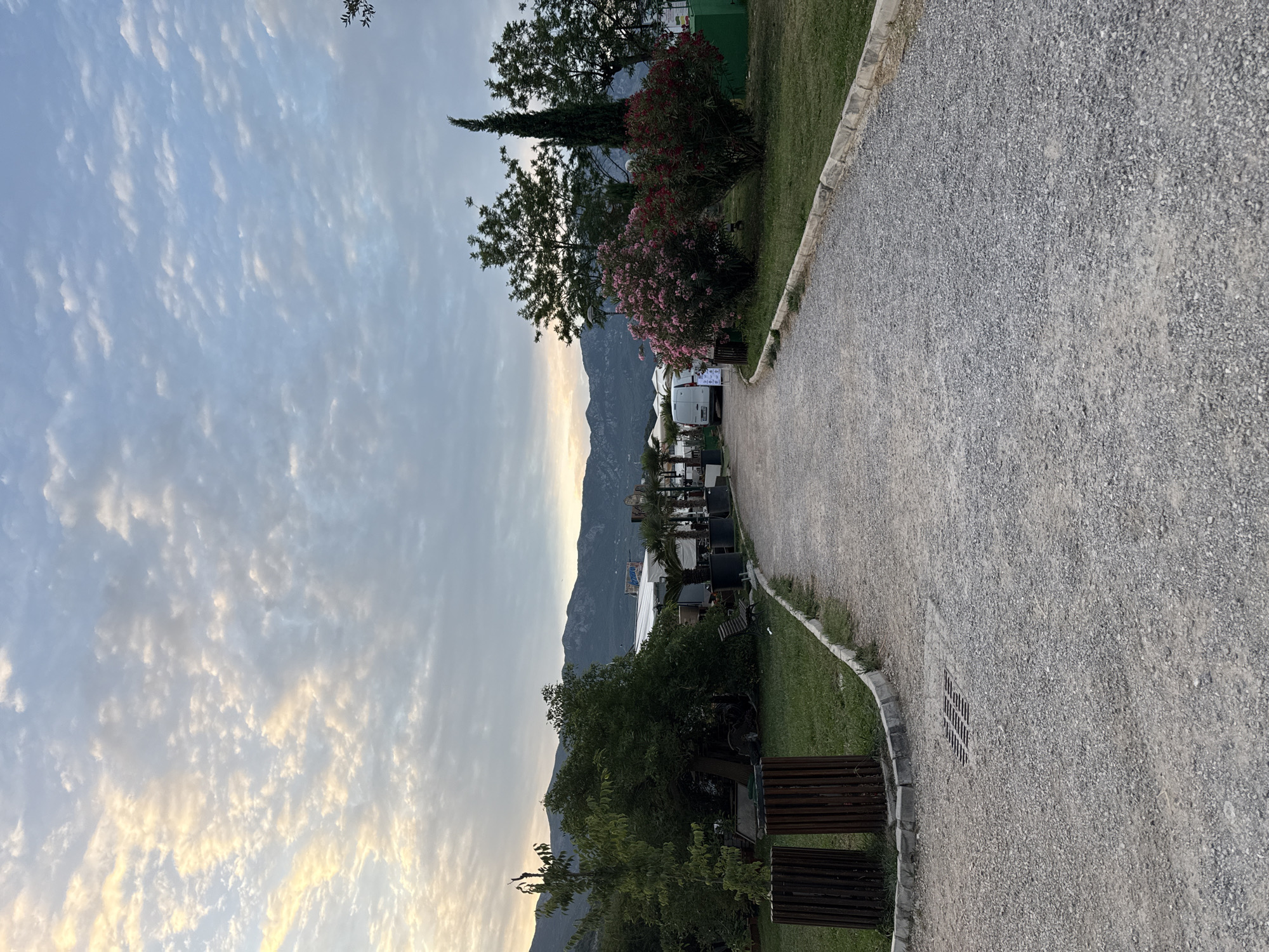 Evening street scenes across Budva's waterfront and construction zones