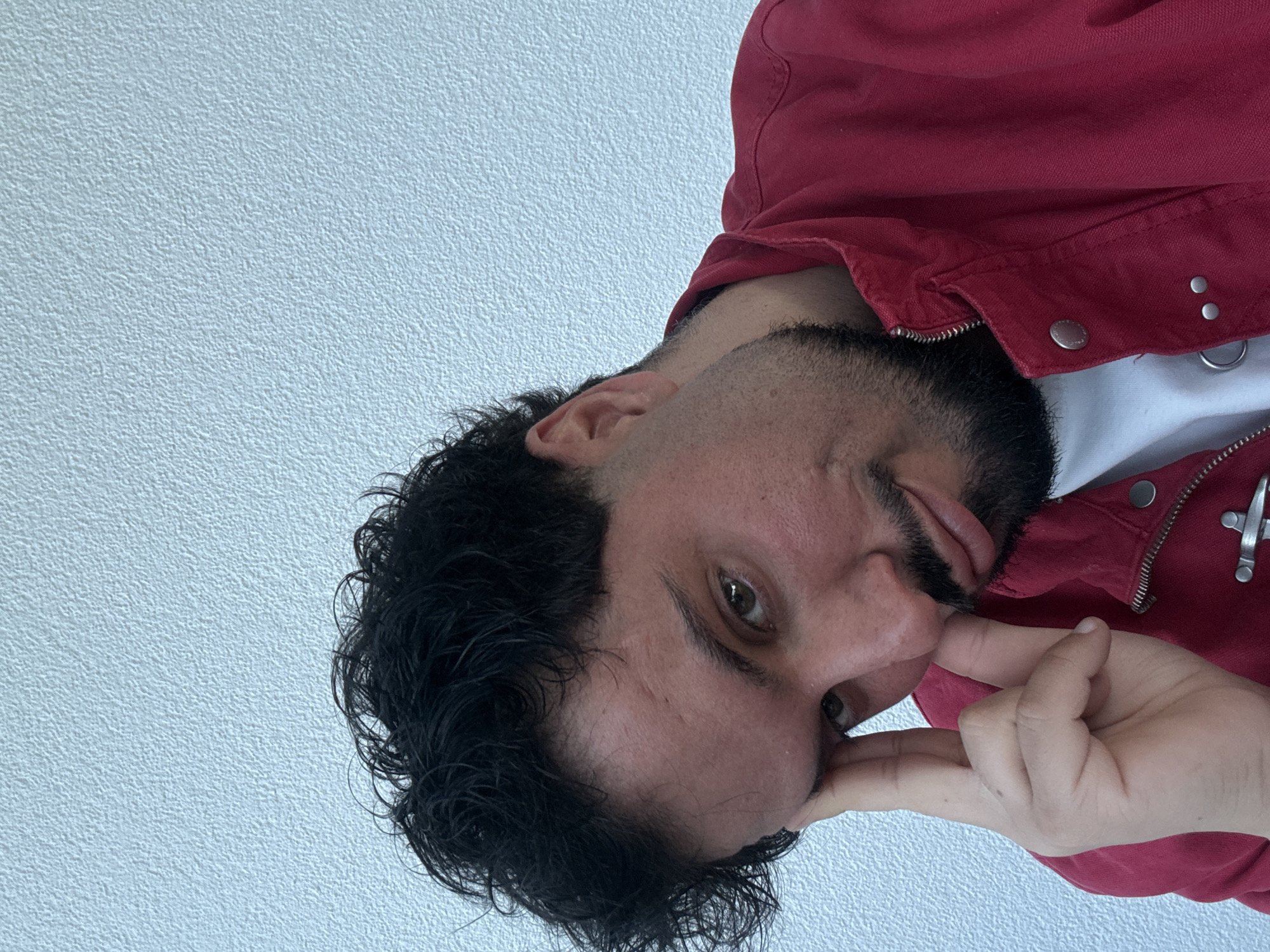 Man takes mirror selfie in Junglinster, Luxembourg