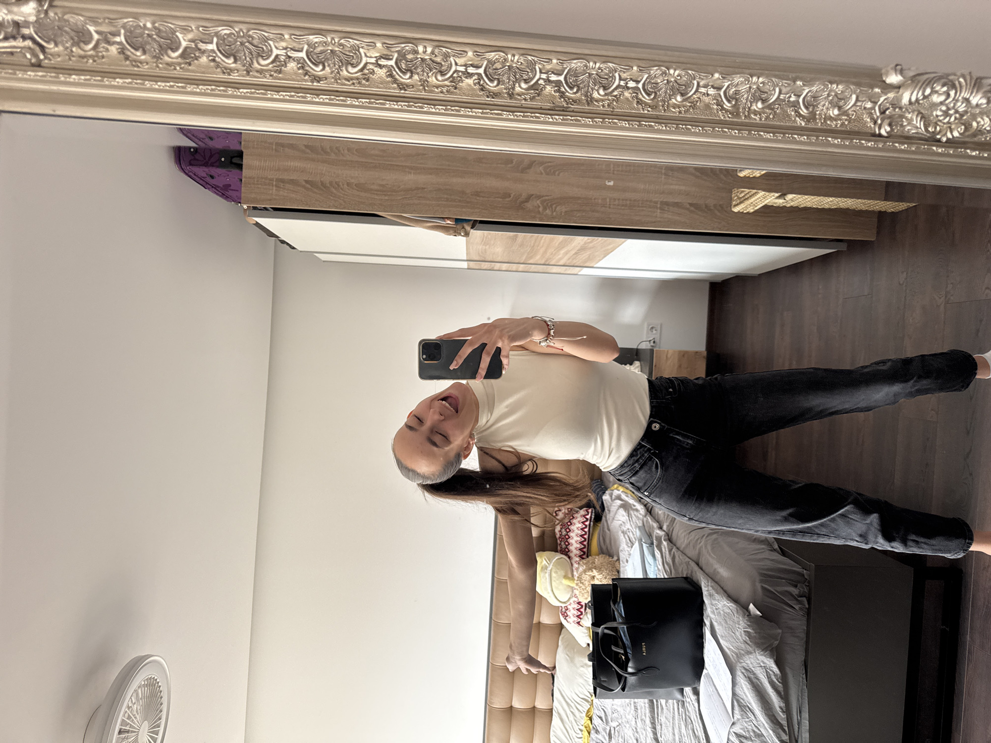 Woman takes selfies in residential space in Sofia