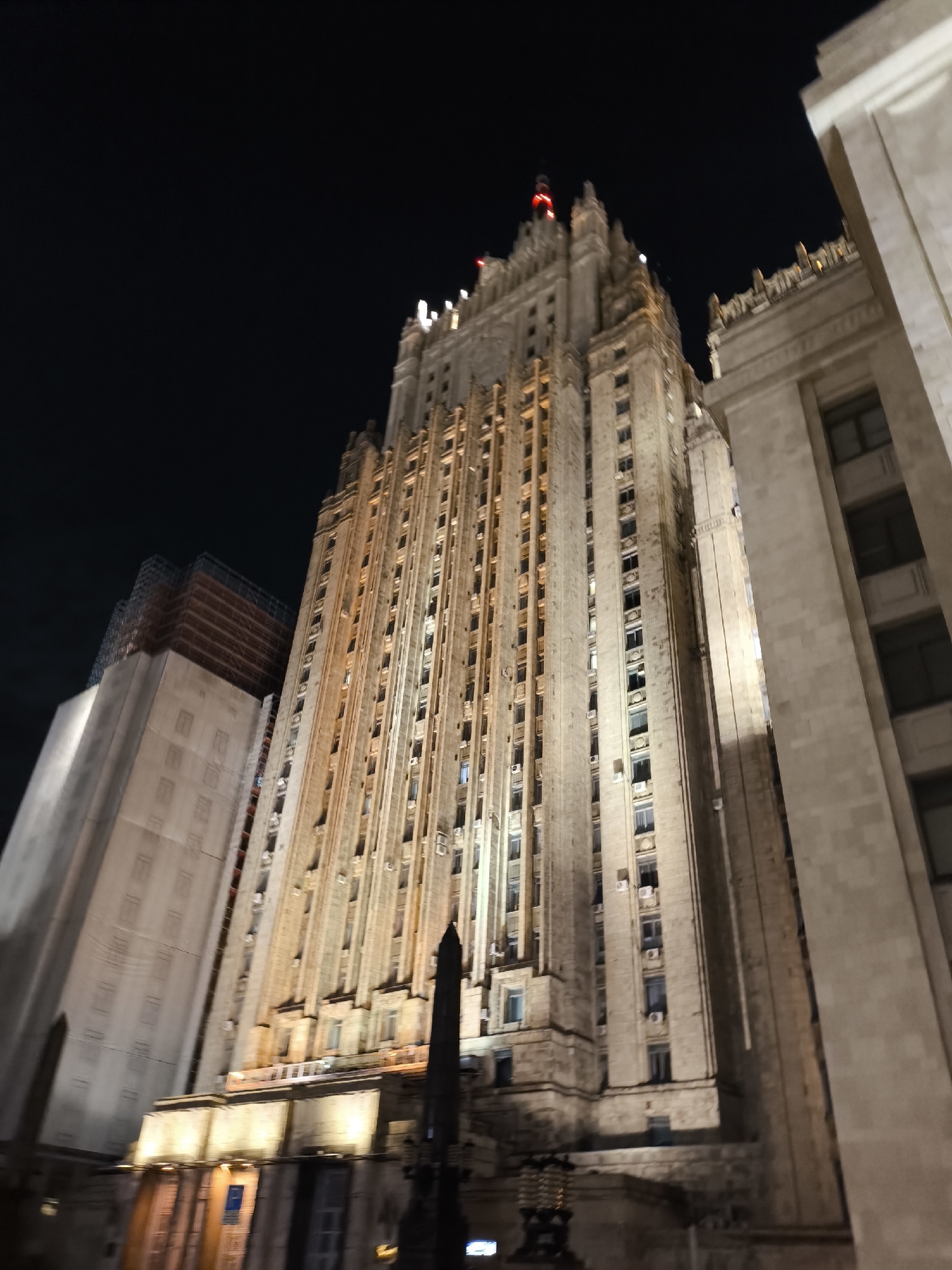 Tourist takes nighttime selfie at Moscow's Stalinist skyscraper