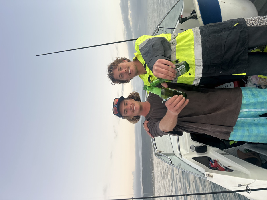 Men fishing from motorboat off Bellambi coast