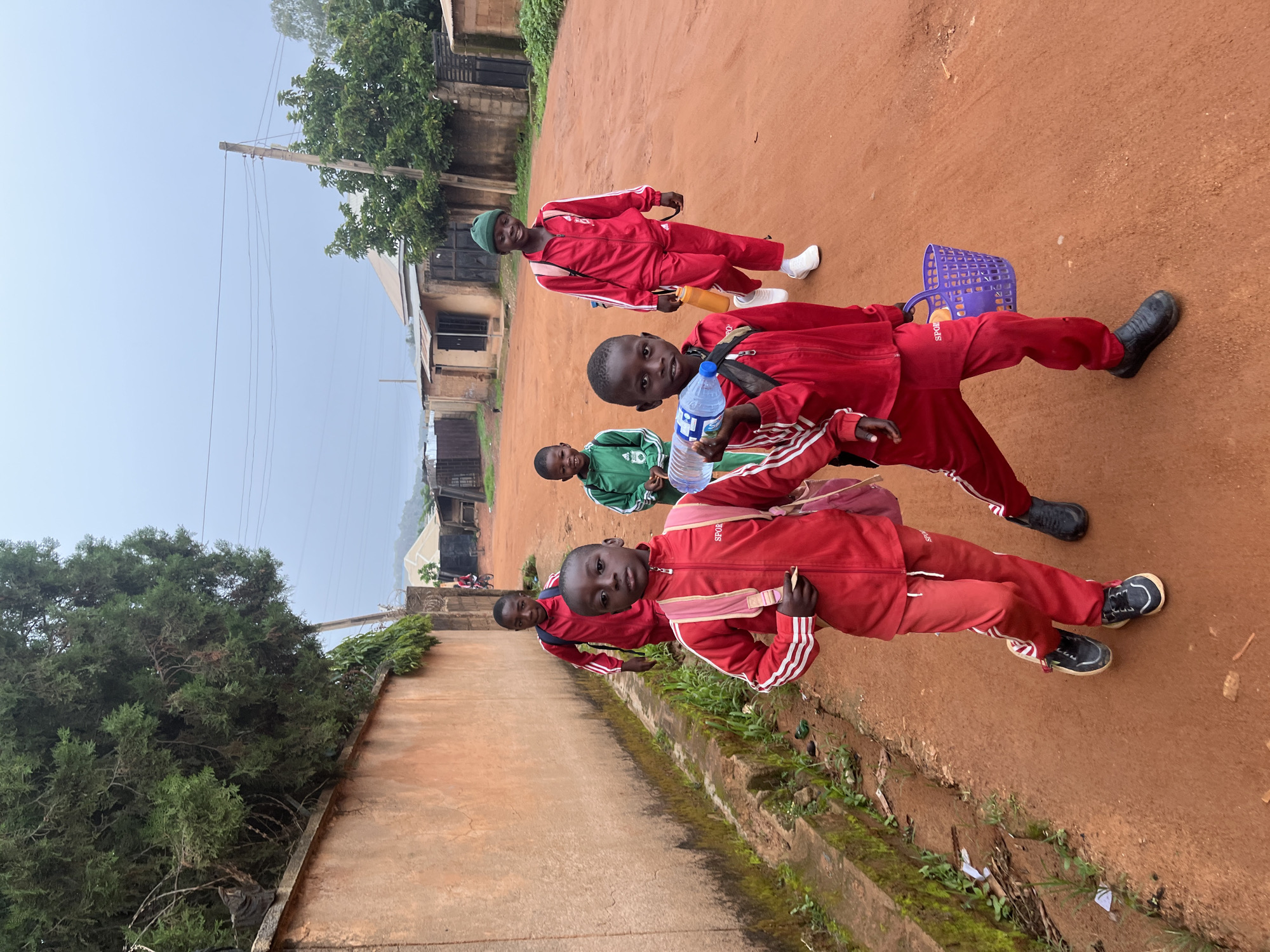 School morning on the dirt roads of Jos, Nigeria